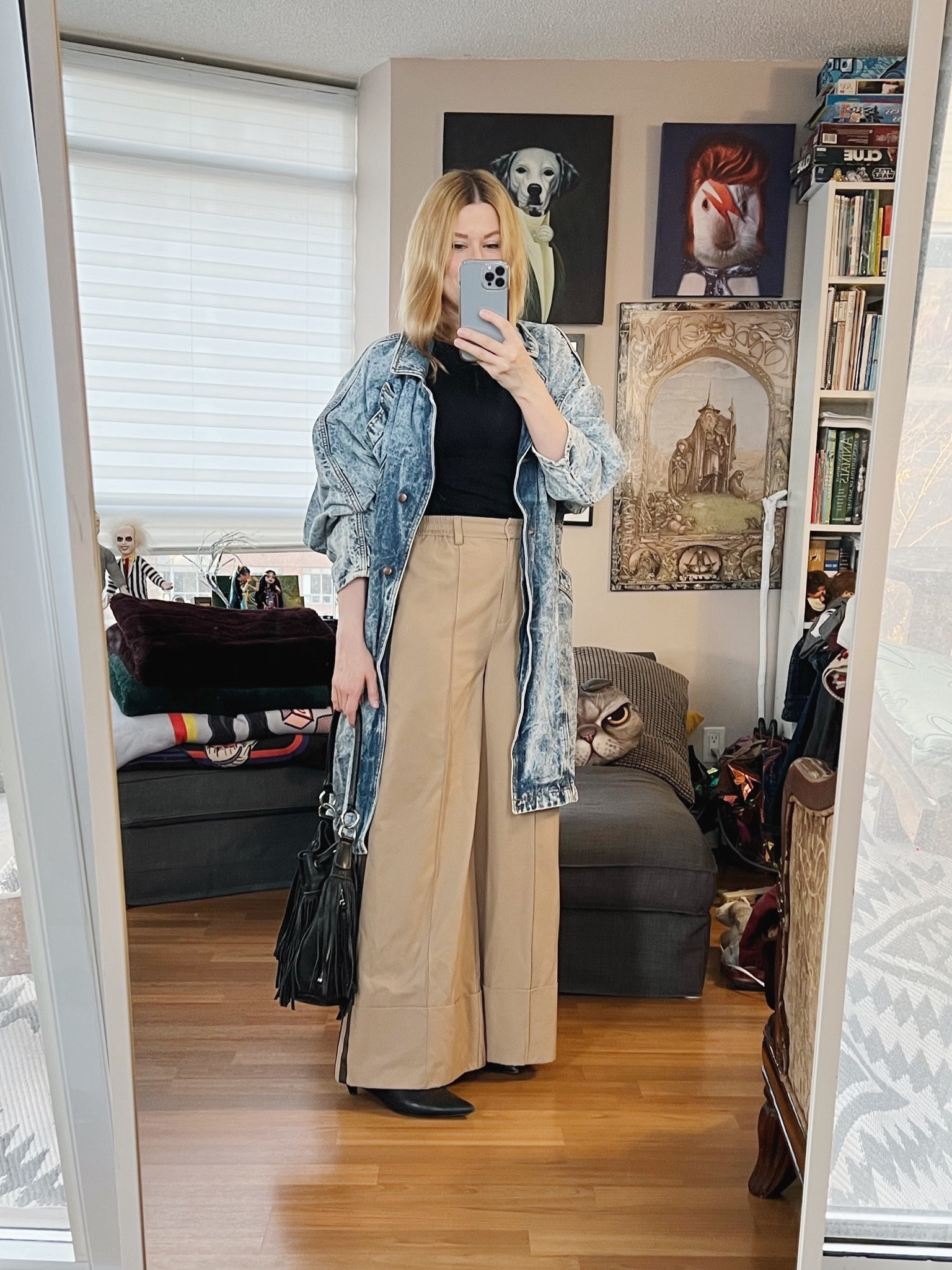 On the weekend question box we talked about how using adjectives to describe your style is a better concept than falling under one style category. Some people didn’t really get it do I’ll try to explain it better. I said that my words were chill, versatile, and classic. I didn’t mention that my modifier word is unexpected. A modifier can be used to tie it all together. So for example, in this outfit the base is chill with the wide leg, elastic waist, and the side stripe brings casualness. The top is a fitted merino wool sweater which is classic, paired with some black pointy tie boots which are also classic. They have a very short kitten heel which is chill and casual to me. Both pieces have the versatile aspect. That’s important to me. I need to be able to wear everything I own in many, many different ways so they can serve many different purposes.
Lots of times people will wear the same pieces in the same way all the time. I try to have new ways to wear them every time I pull them out. My modifier is unexpected which I get from this vintage acid wash jacket. It just ties it all together to become me. Without it, it feels one dimensional and not very me. I could get the unexpected part by adding a variety of pieces but it was warm again today so a denim jacket worked best. Any clearer? Questions? 
Also, this look is head to toe secondhand today. Every piece.
•
.  #FallLook  #StyleOver40  #wideLegTrousers  #vintageClothes  #gucci  #styleGuide #secondhandFind #FashionOver40  #MumStyle #genX #genXStyle #genXInfluencer #thriftFind #WhoWhatWearing #genXblogger #poshmarkFind #Over40Style #40PlusStyle #Stylish40s  #HighStreetFashion #StyleIdeas


#LTKstyletip #LTKSeasonal #LTKshoecrush