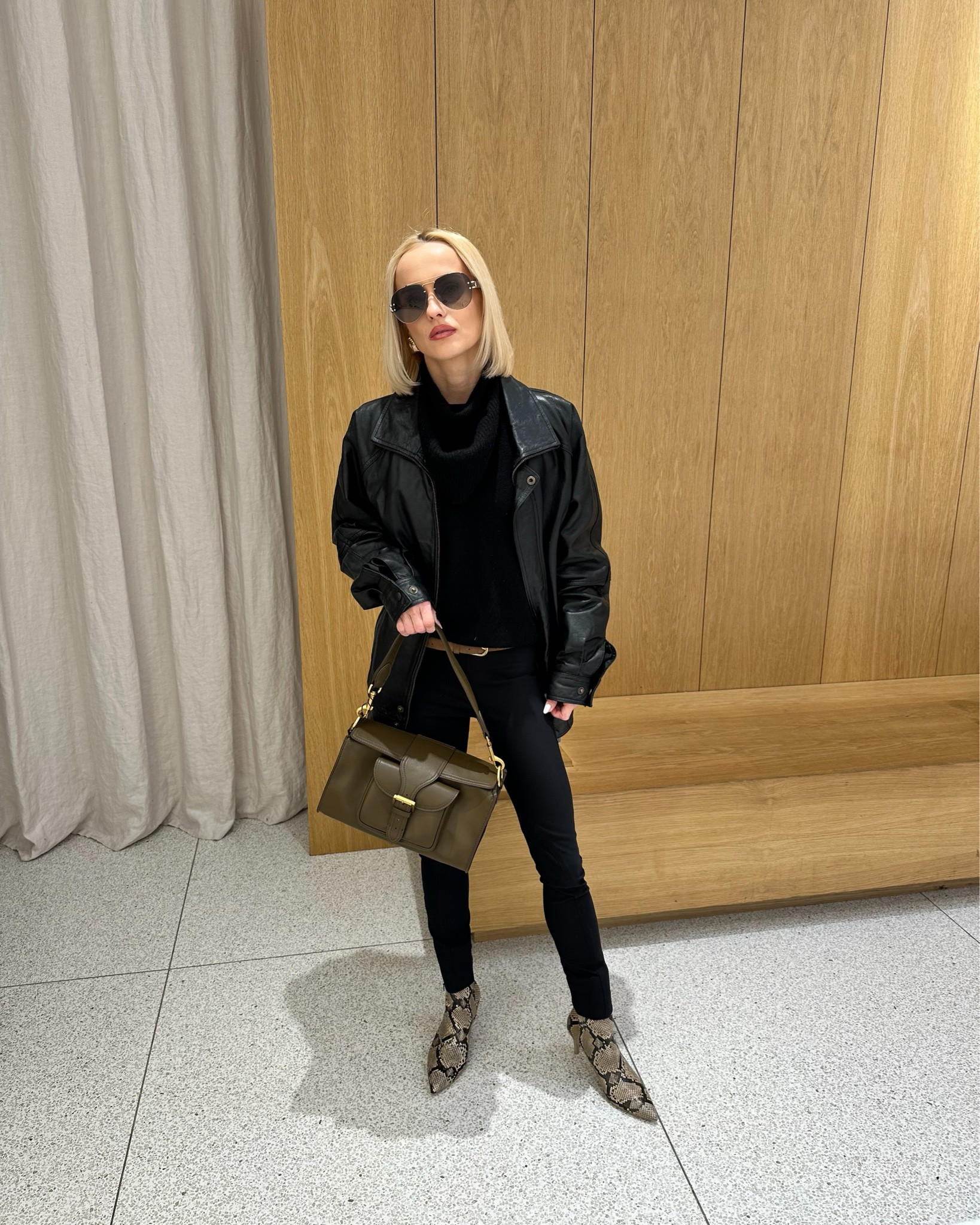 80s 90s inspired 

Total black look with this season of of the most trending python print shoes accompanied with the matching bag.

Revolve aviator brown sunglasses, Vintage leather jacket, Reiss suede belt and  black cashmere sweater, Stella Mccartney slim fit trousers, Zara bag, H&M python boots



#LTKuk #LTKeurope #LTKspring
