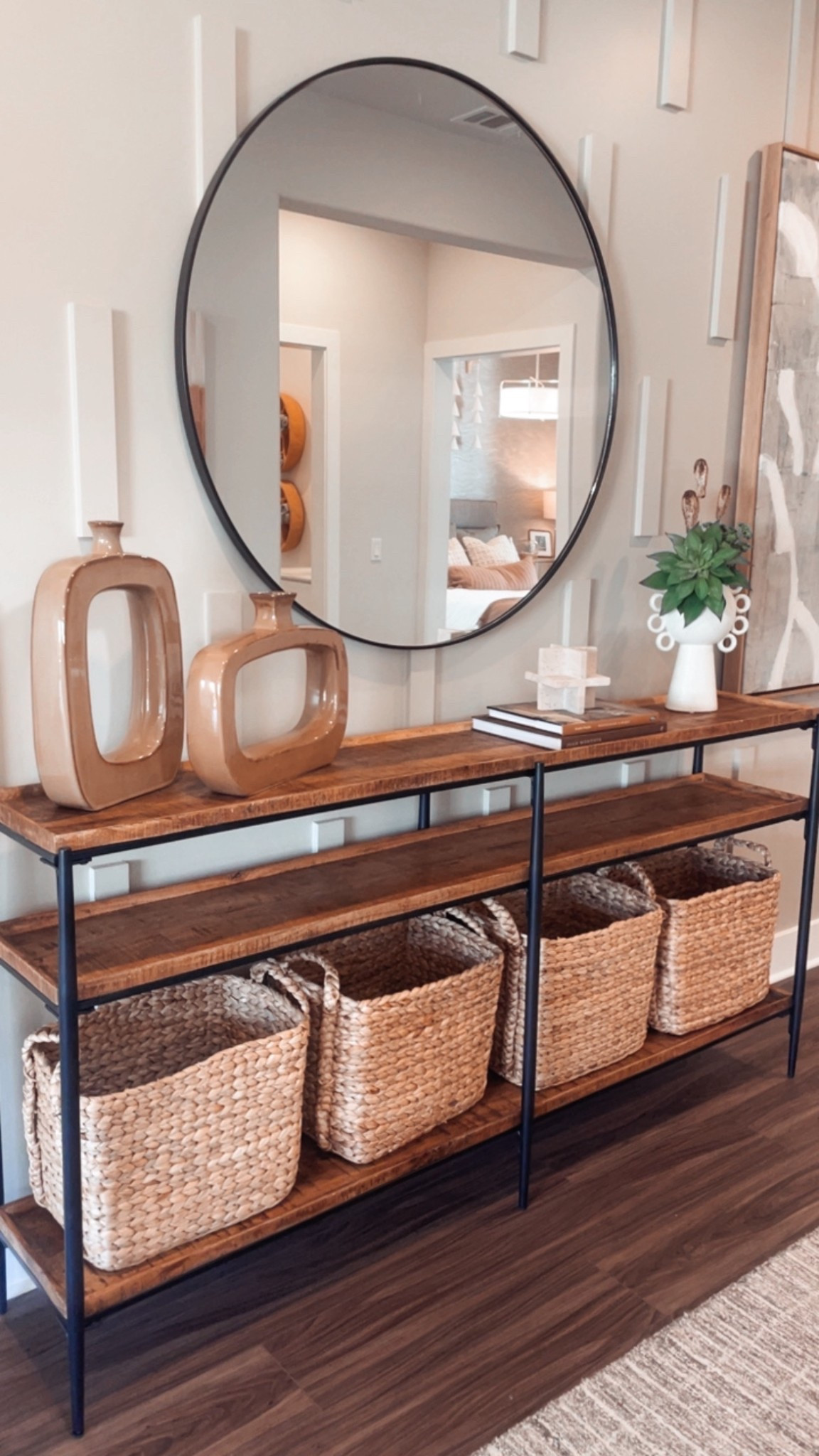 This modern farmhouse style, wood and black iron console table is perfect for a hallway style entryway. 👍🏻 

Long and narrow with three shelves for storage. 


#LTKSaleAlert #LTKHome #LTKmomlife