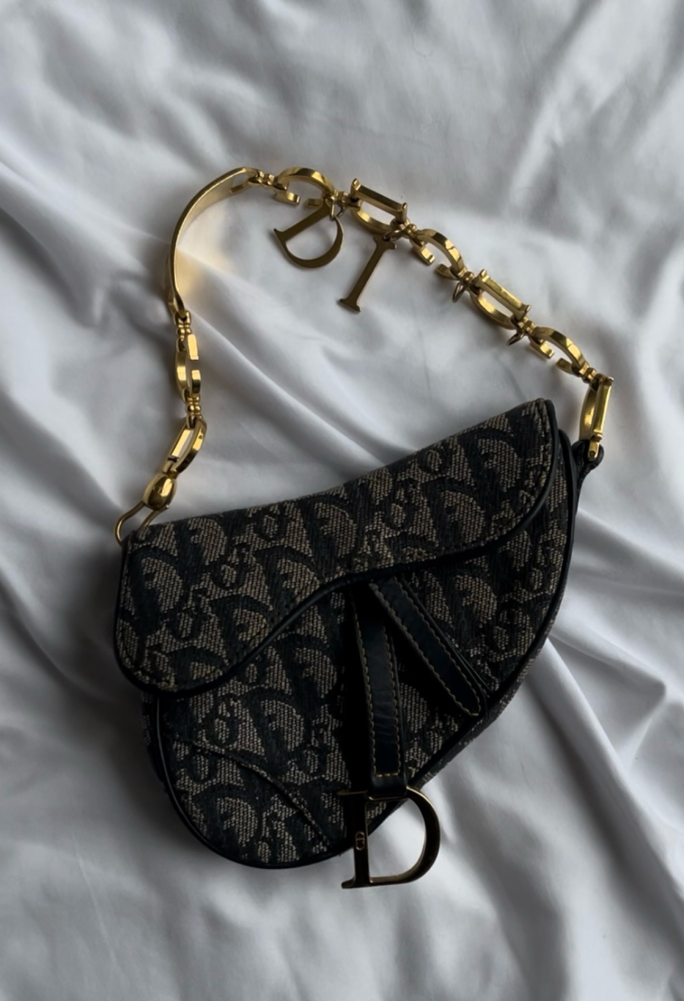 This is the perfect vintage saddle bag for those who want something a little different. The gold metal strap is extremely rare and is sure to stand out!

#LTKGiftGuide #LTKitbag