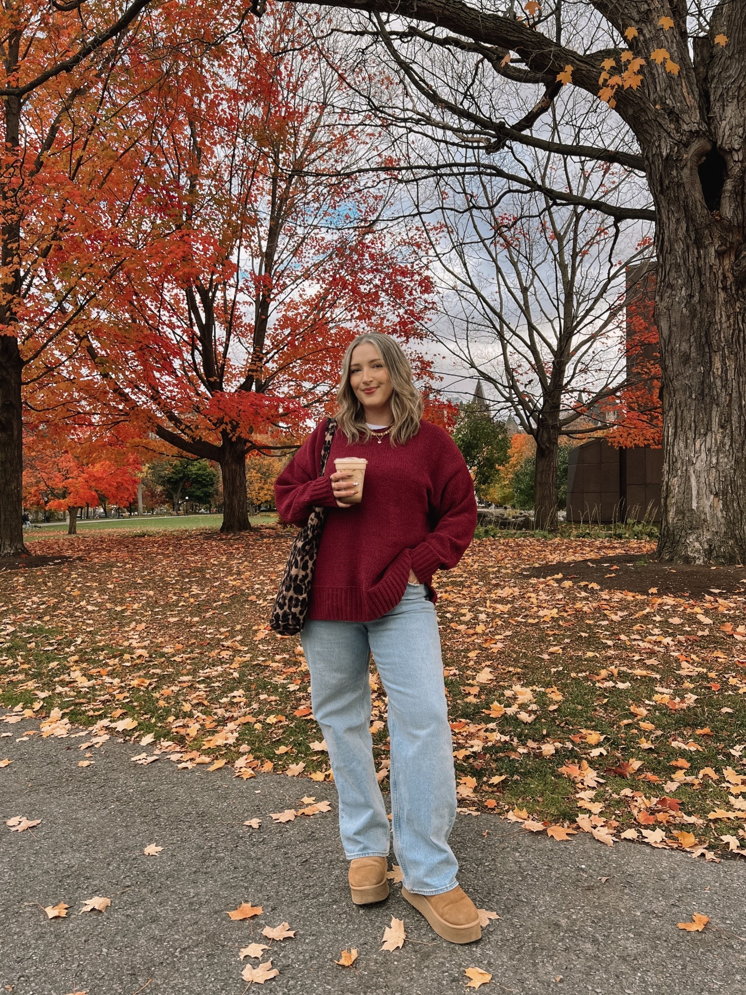Fall ootd! Wearing my usual size L in the tee & burgundy sweater (it’s chenille and so soft)! Wearing 32 in the jeans, could have done 31 but I prefer a looser fit for comfort. Ugg look for less are Amazon and holding up so well. I’m a 9.5-10 and wear a 10. 
Midsize fall outfits, thanksgiving outfit ideas

#LTKmidsize #LTKsale #LTKjeans