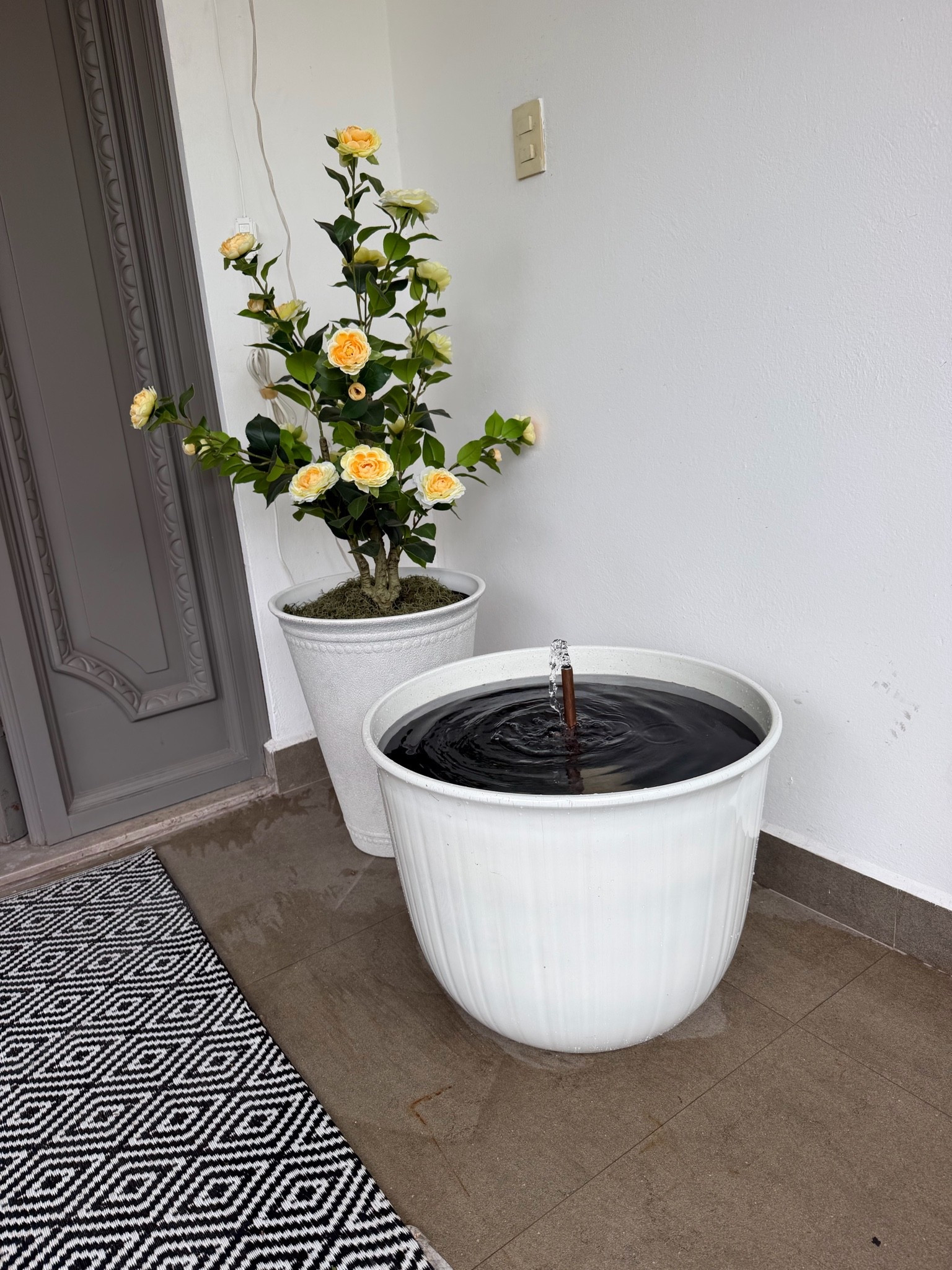 This faux flowers and the DIY fountain😍😍