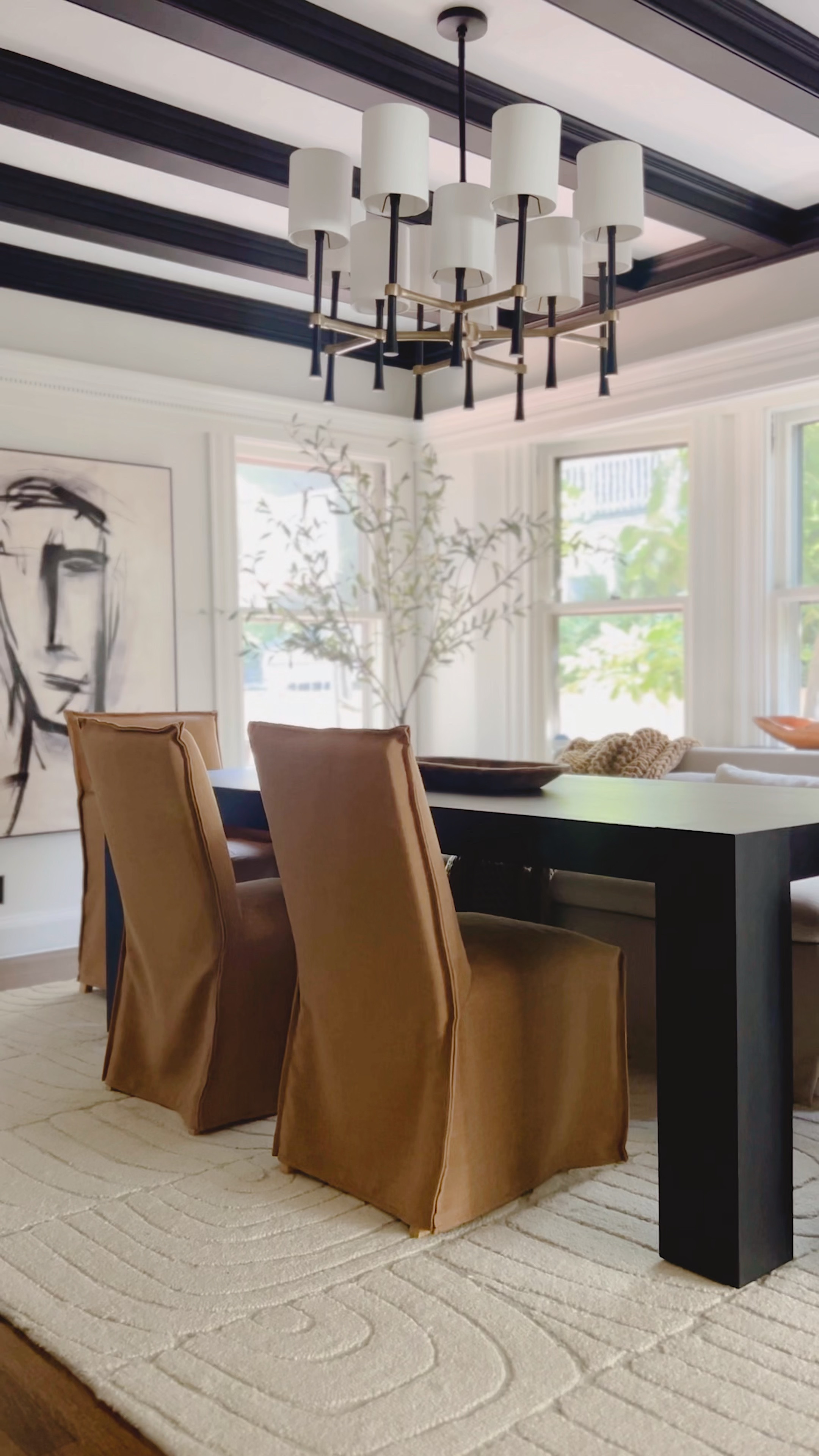 Do you know the trick to creating the best dining room? Incorporate neutral and textured decor! Here I added a large wall art, faux potted olive trees, beautiful brown dining chairs, a black dining table, and a beautiful metal chandelier to create the perfect space for family gatherings!

#LTKhome #LTKFind #LTKstyletip