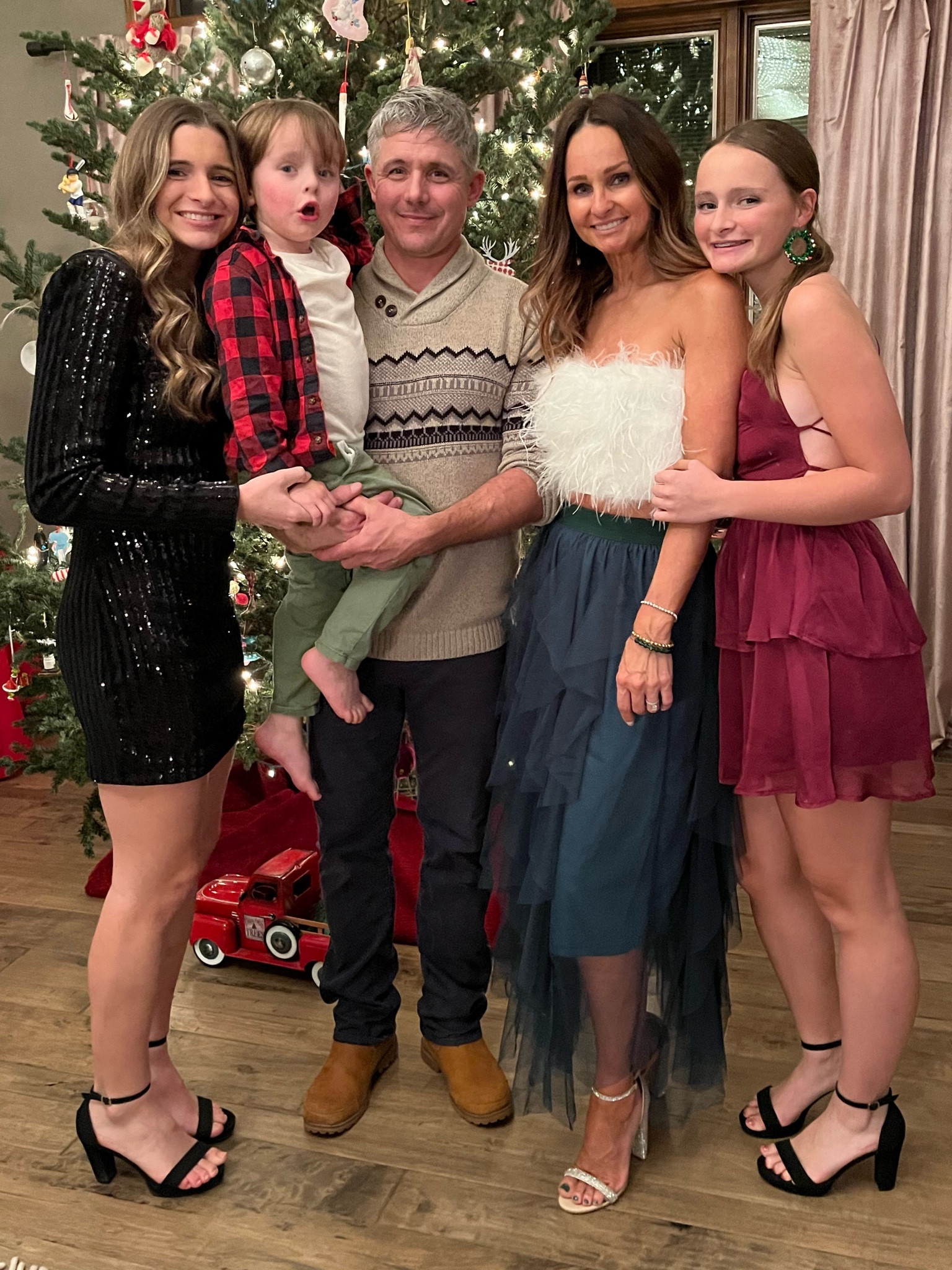 My feather top is on huge sale rn. I’m wearing a S. 
Obsessed with the color of my skirt. Also wearing a S. 
And I love the shoes. TTS.

cropped tube top / strapless / rhinestone heels / holiday party / tulle skirt

#LTKHoliday #LTKsalealert #LTKfindsunder50