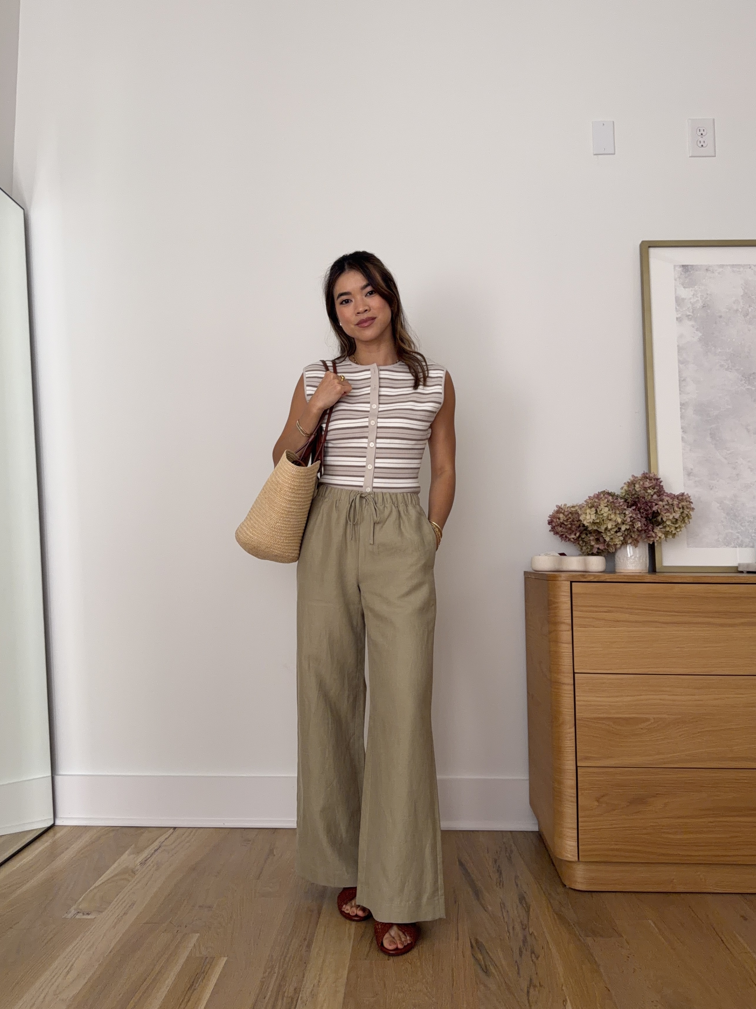 These @Aritzia pants are some of my favorite petite pants! I love the length on me (I’m 5’2).

Sizing info:
-Aritzia Golightly Sleeveless Cardigan (Size XS in Mtrpls Taup /Lt Brch) 
-Aritzia Lodge Pant Cruiselinen (Size 2XS Short in Martini Olive) 
-Sezane Low Paola Mules - Mohogany Smooth Braided 

Petite style, petite fashion, mom outfit, mom style, petite pants, petite outfit ideas, petite outfits, best pants for petite, petite pull on pants, spring style, spring outfits, beach outfits, vacation outfits, summer outfits, Summer style, summer trends, summer linen pants, aritzia pants, petite aritzia

#LTKootd #LTKSeasonal #LTKPetite