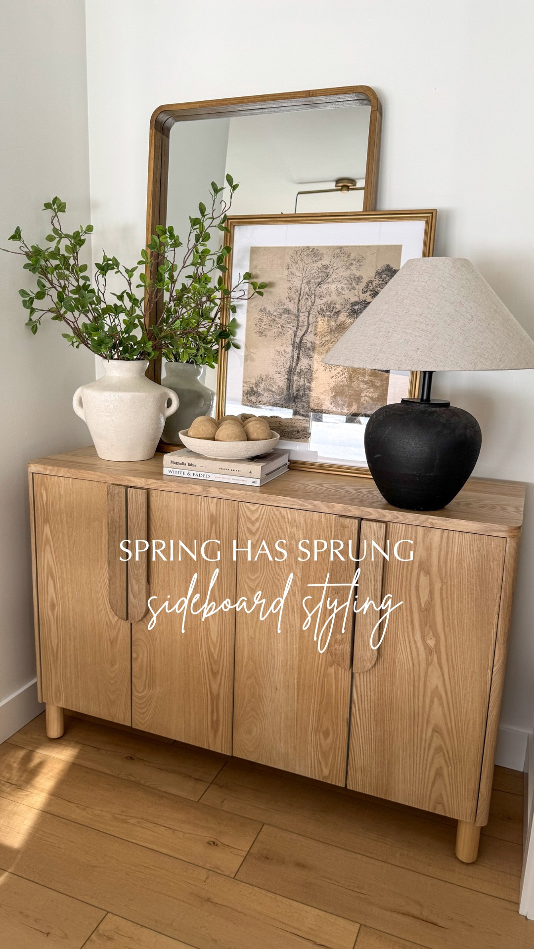 Spring has sprung🤍

Giving my sideboard a new look! Added a pretty mirror to reflect the sunlight and an earthy piece of art. Styling some pretty faux branches and coffee table books with a gorgeous textured bowl and my favourite organic bowl filler.

#sideboard #springstyling #homedecor #homefinds #springdecor#LTKSpringSale 

#LTKHome #LTKSeasonal