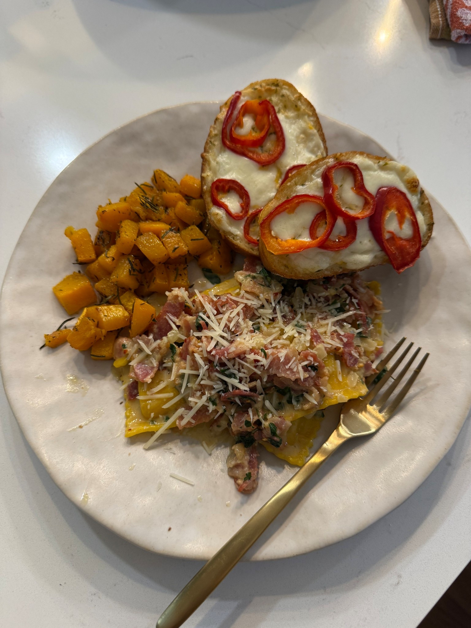 Day before grocery pick up is tomorrow. That means bare bones today. I put together what I had and made homemade bacon carbonara, roasted butternut squash, and mozzarella and fresno chili garlic toast. Turned out amazing 🤤

#LTKvlog #LTKHome #LTKfoodie