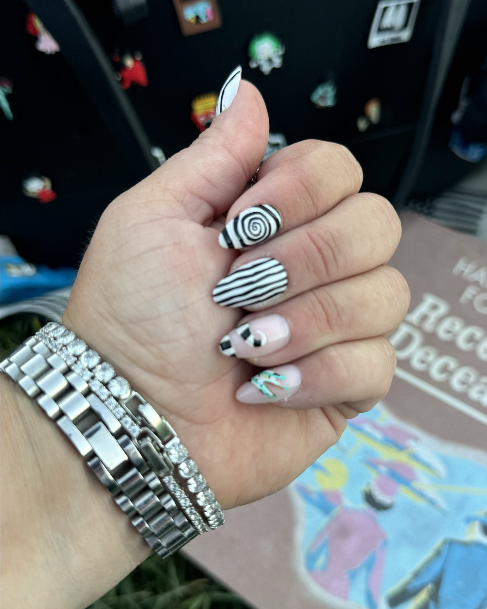 Beetle juice nails press on nails 

#LTKBeauty #LTKStyleTip