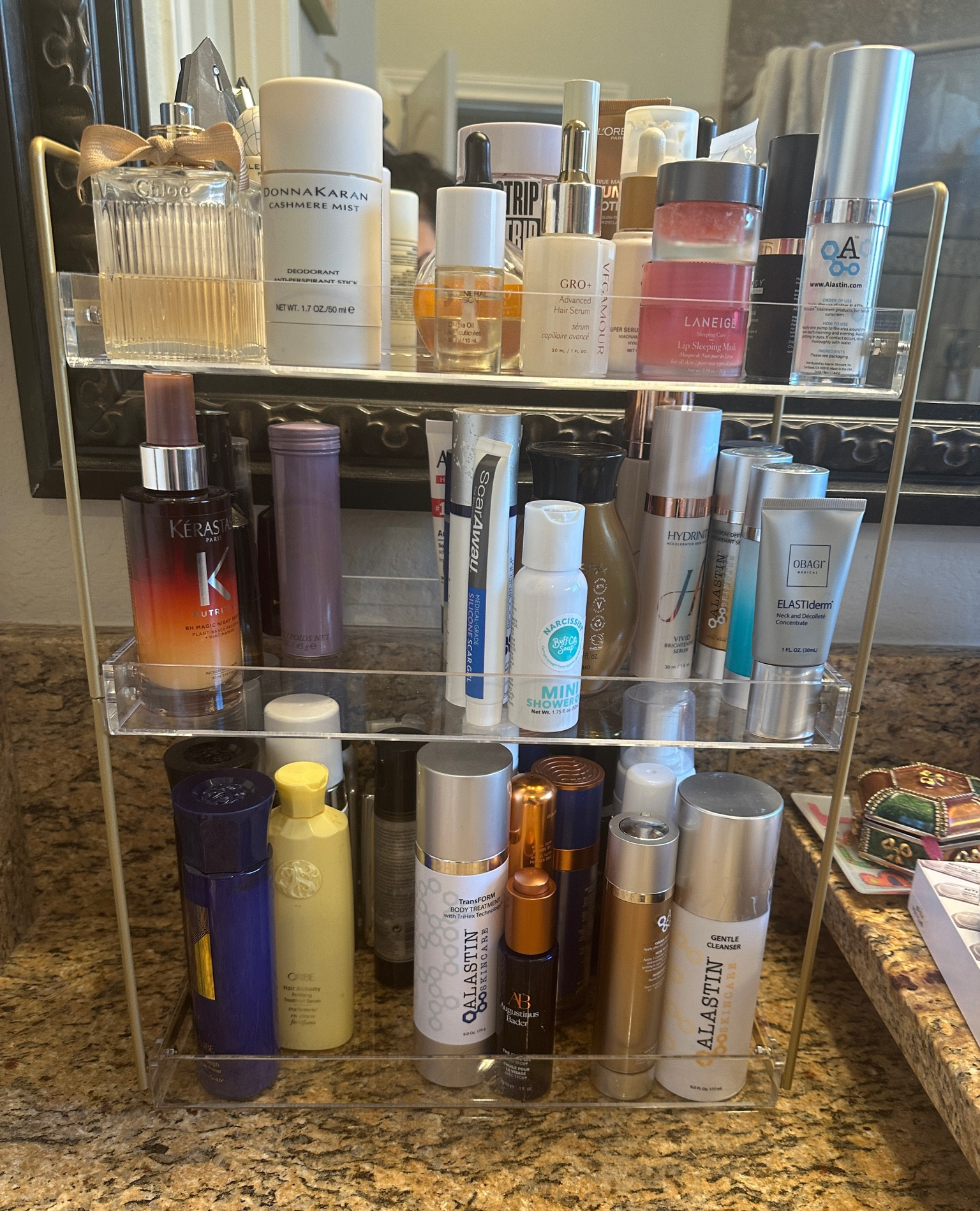 2024 home organization is under way! I have been purging old or nearly empty beauty products and working on my bathroom today. This acrylic gold 3 tier stand holds so many of my beauty items! #amazonfinds #organization 

#LTKhome #LTKbeauty