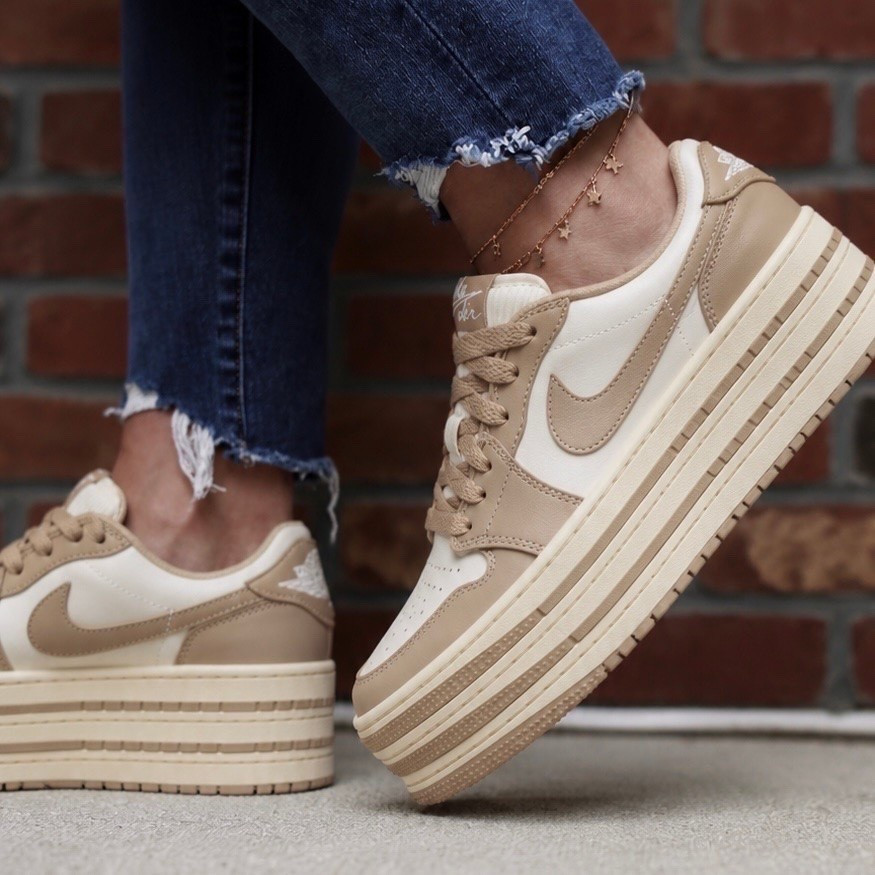 The Nike Air Jordan 1 Triple Platform Basketball Sneaker is the perfect mix of sporty and trendy, with an elevated platform that instantly gives your outfit a chic boost. They fit true to size