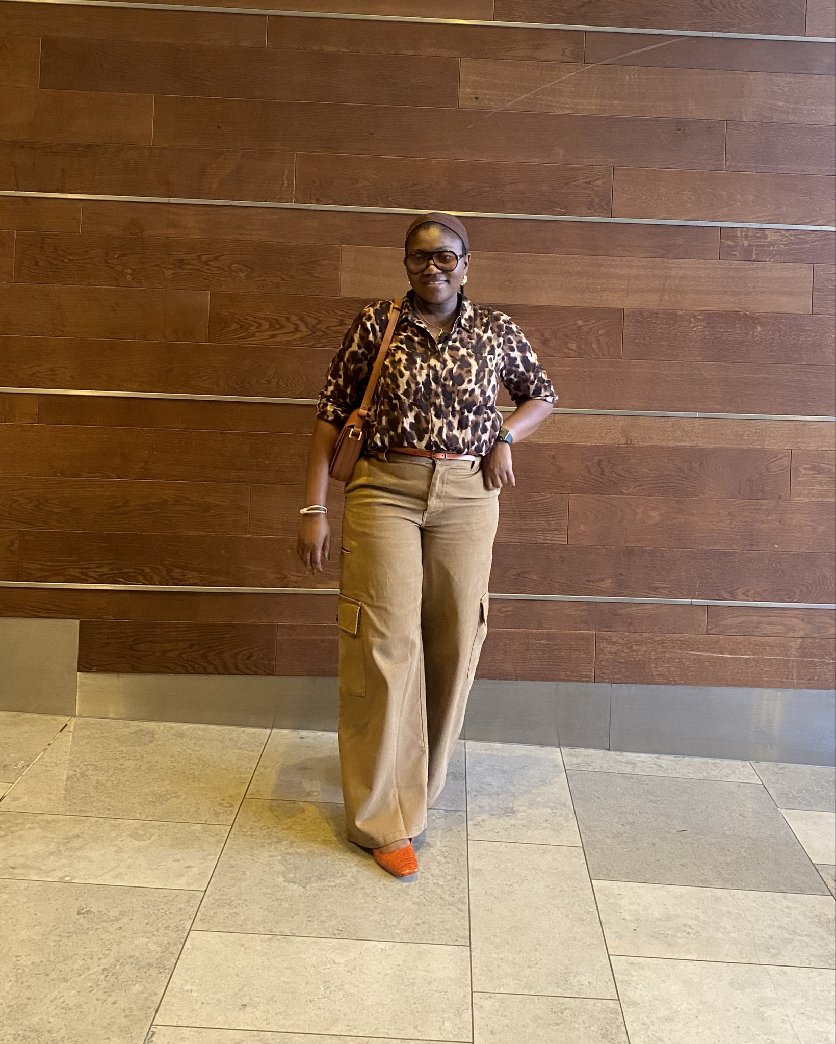 A moment in @hushofficial wearing my leopard chiffon shirt tucked into wide-leg cargo trousers.The orange leather belt adds a pop of color, while my croc-effect flats and tan crossbody complete the look. Don’t forget the leopard print sunglasses and gold accessories for that extra flair! 
Shirt x cargo trouser x necklaces: @hushofficial #hushcreator #inHush
———-
#OOTD #whatıworetoday 
#FashionInspo #StyleDiaries #LeopardPrint #ChicStyle #CargoPants #EffortlessStyle #OOTD #FashionGoals #StreetStyle #AccessoriesMatter #ColorPop #TrendyLooks #OutfitOfTheDay #Fashionista #CasualChic #WardrobeEssentials #HushFashion #LeopardLovers #SunglassesStyle #GoldAccessories 

#LTKstyletip #LTKuk #LTKsale
