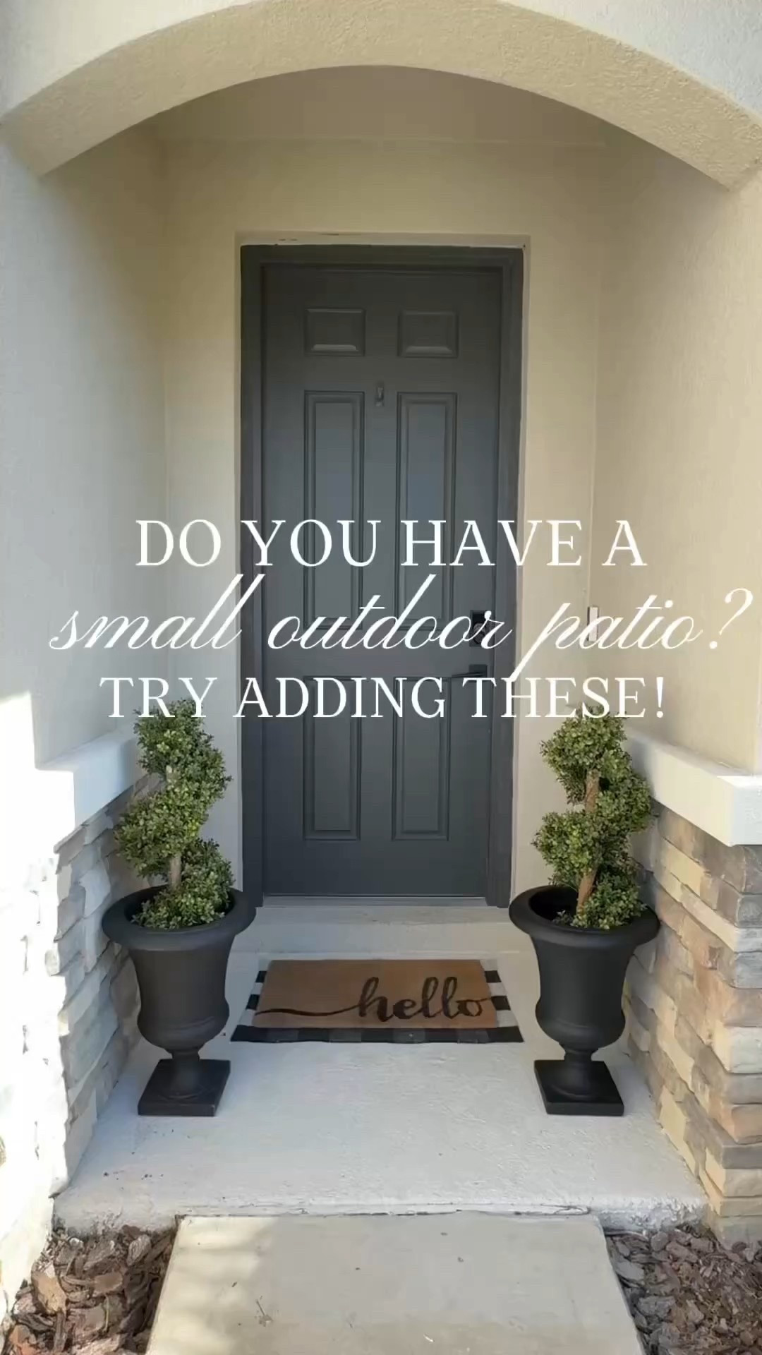 Small porch? No problem. These topiary trees and classic matte black black planters add an elevated touch without overwhelming the space—proof that even the tiniest entry can make a stylish first impression.

Paint your front door a bold, deep gray (Sherwin-Williams Iron Ore – I used a color match from Valspar Seasonal Exterior in a matte finish). 
Freshen up the concrete floor with a soft white (Sherwin-Williams Downy – also color matched from Valspar Seasonal Exterior ). 
Easy updates, big difference.
#FrontPorchRefresh #SmallPatioIdeas #CurbAppealMadeEasy #lowesfinds

#LTKSeasonal #LTKHome