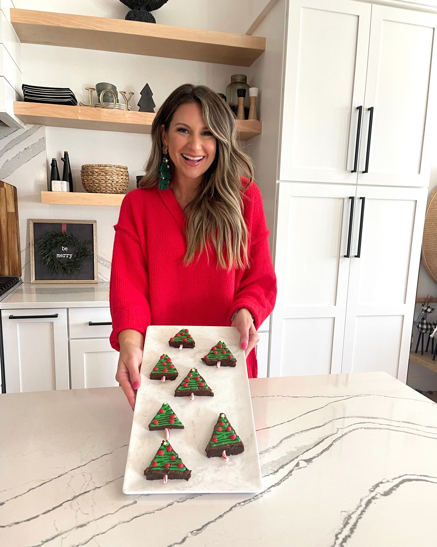 In a small sweater and medium leggings with Christmas bow mules and earrings from Amazon - all fits TTS.

#LTKstyletip #LTKHoliday #LTKhome