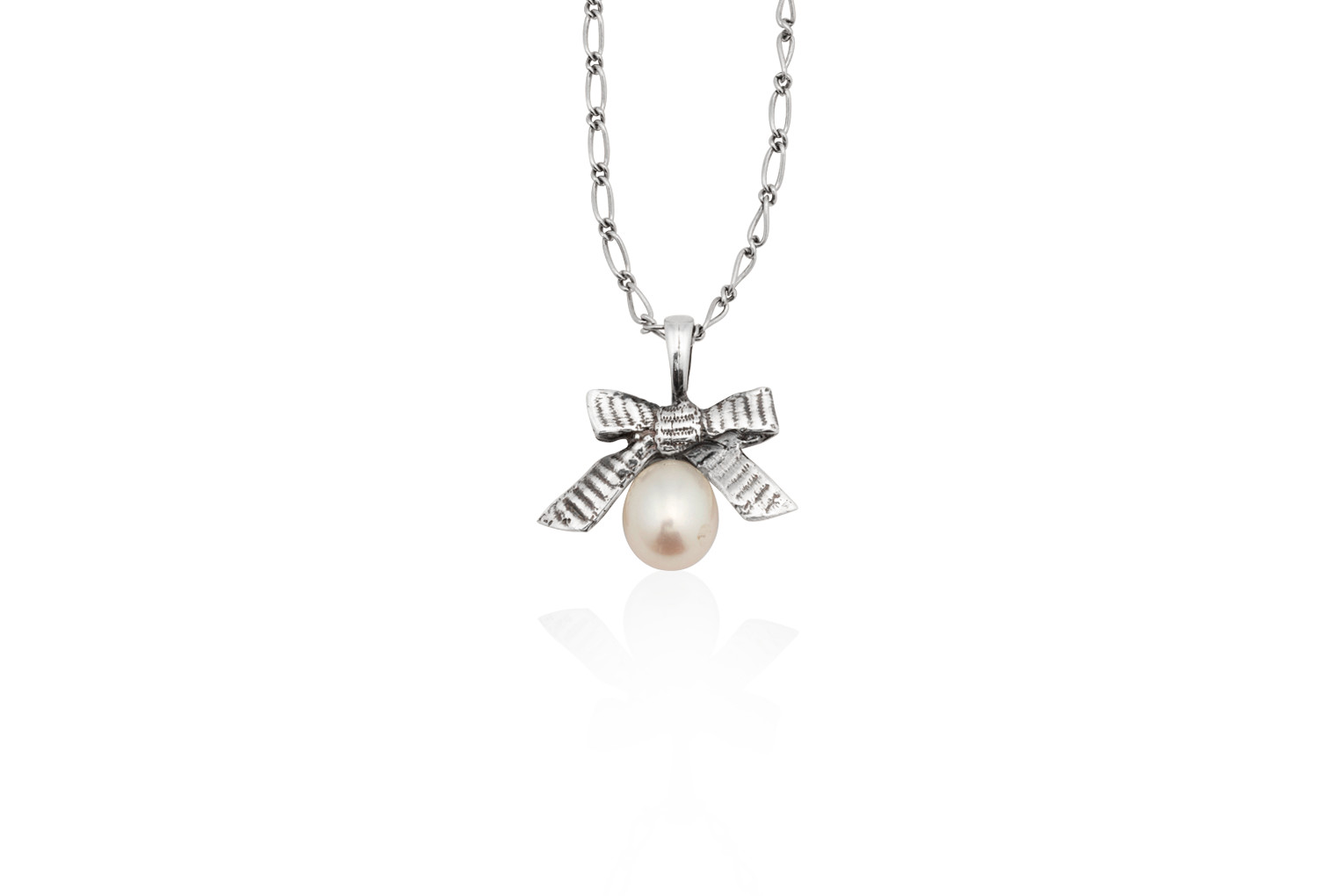 Pendant from the Knots & Bows collection. Sterling Silver or 14K Gold.Real grosgrain ribbon is us... | Mignon Faget