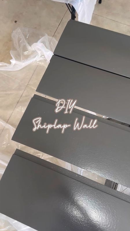 DIY shiplap wall! We used primed shiplap and went with Behr cracked pepper for color-it is their 2024 paint color of the year! The perfect warm toned charcoal gray that isn’t too cool.


#LTKhome #LTKVideo