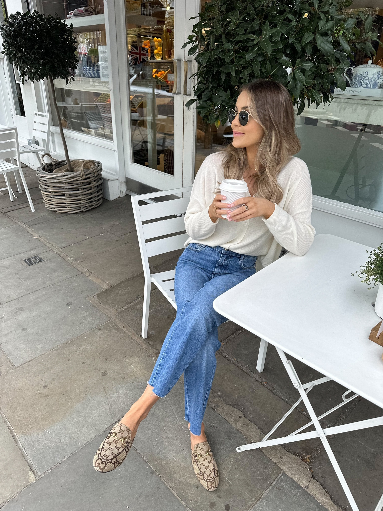 Casual spring coffee date look - blue mom jeans, Reiss fine knit cream cardigan, Gucci princetown loafers & rayban round sunnies  

#LTKstyletip #LTKeurope #LTKSeasonal