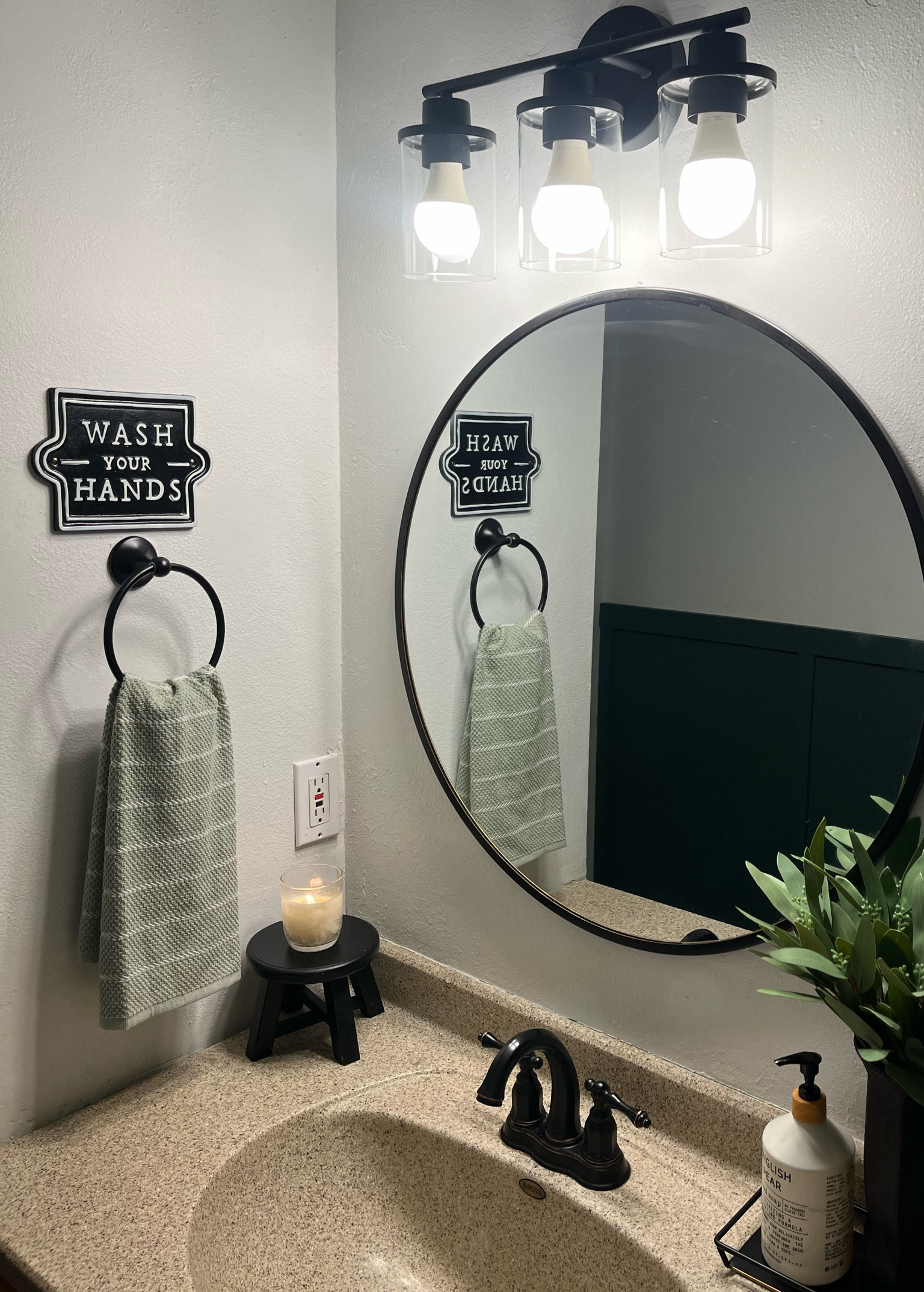 Modern, sleek, matte black vanity light. 3 globe vanity light fixture, modern, farmhouse, affordable. Under $50

#LTKhome #LTKsalealert #LTKFind