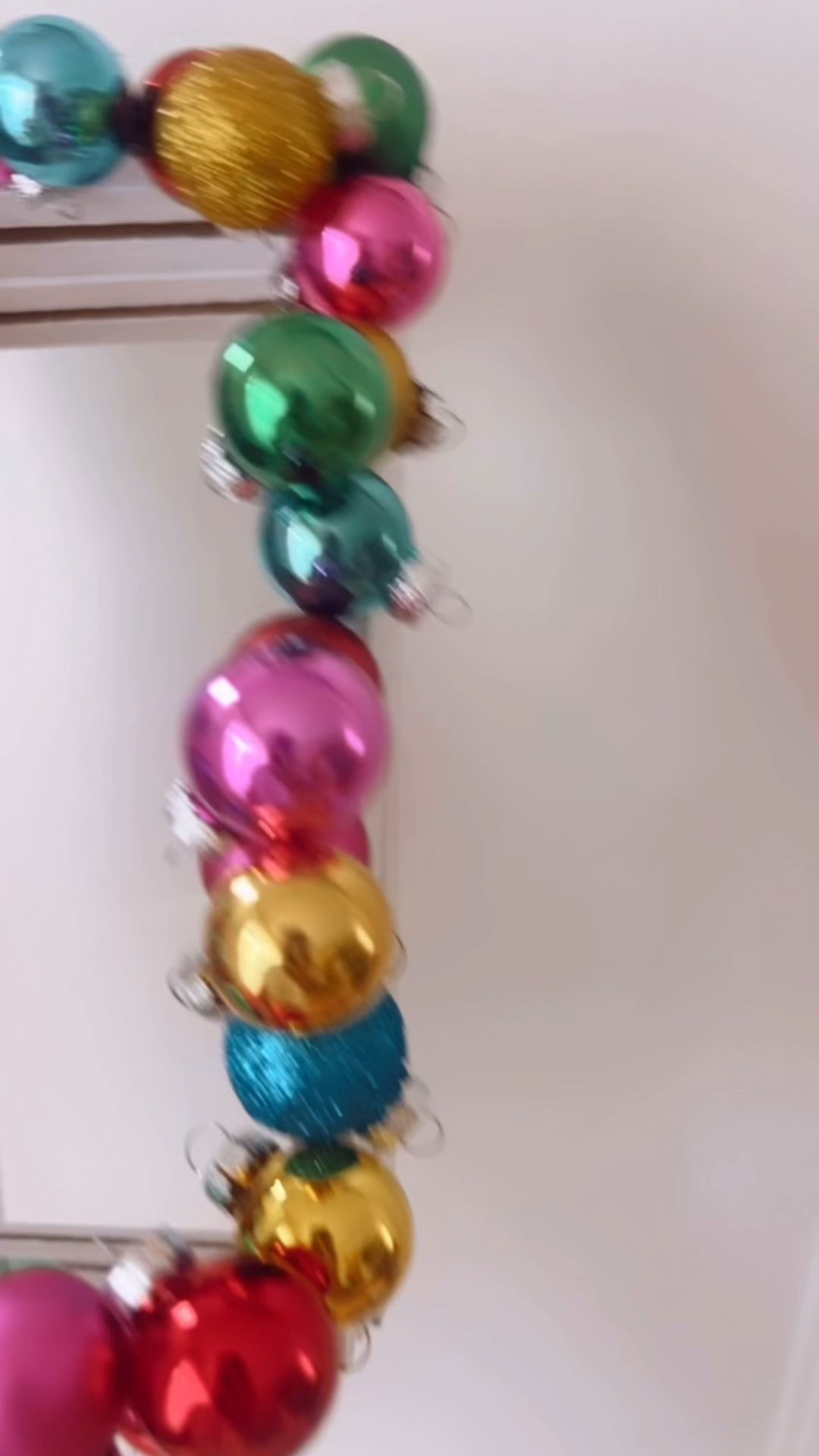 WIP ✨💖🎄
… I may be finishing this one up after Christmas, but sharing in case anyone needs a last-minute gift or craft idea (could also do w kids)! I bought these packs of mini ornaments several years ago, because they were close to my brand colors and I love the vibrancy. I’d seen someone create a frame of layers of them adhered to a simple frame and I love how it’s turning out so far! (To let set properly, I add a few each time I walk by and prop water bottles around those just glued to keep them in place til dry.) 

I linked some colorful ornament options and the glue I prefer - any simple frame will work!


#LTKSeasonal #LTKGiftGuide #LTKHoliday