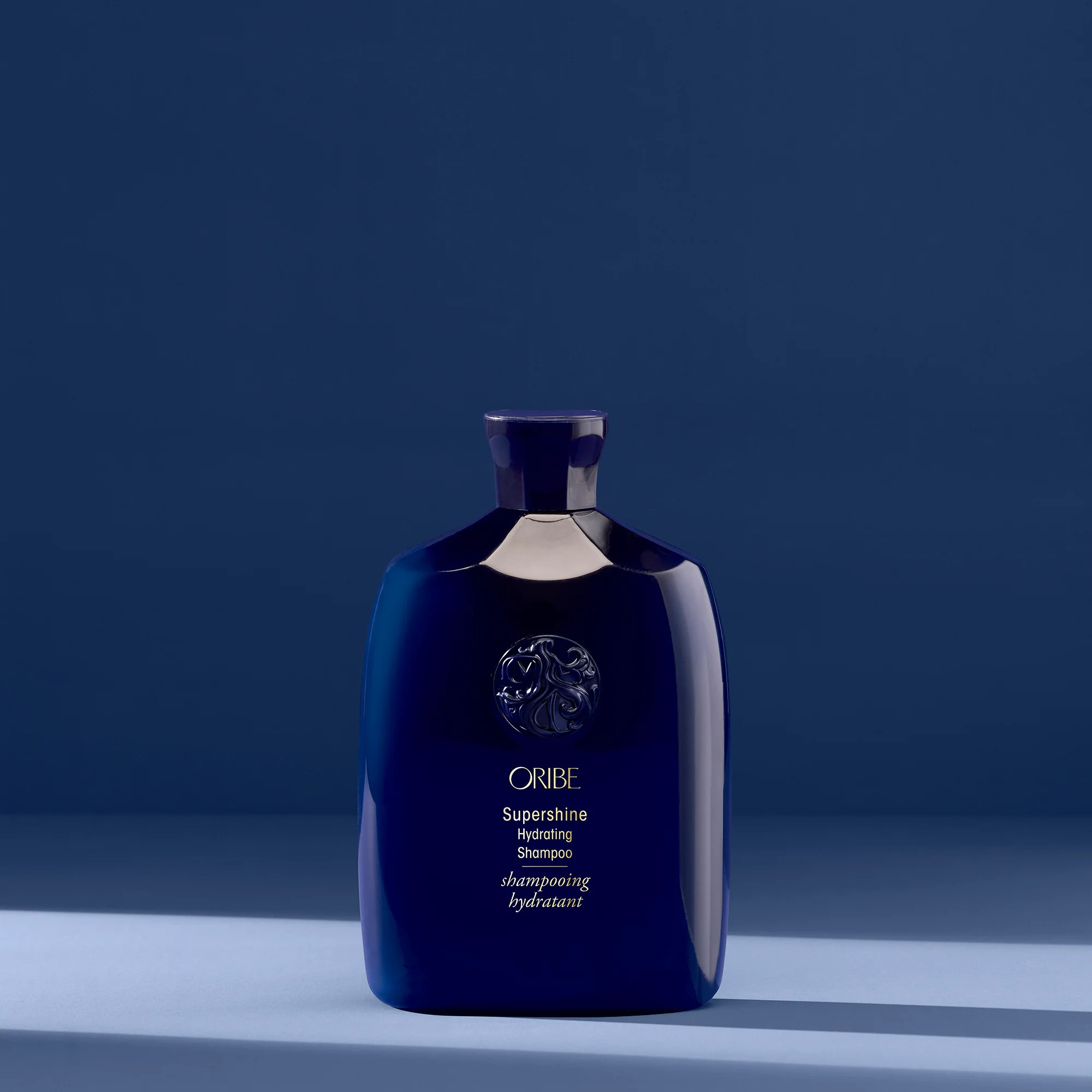 COMPLIMENTARY SHIPPING WITH PURCHASE OF HAIR ALCHEMY BOND BUILDING ELIXIR THROUGH JULY. NO CODE R... | Oribe Hair Care