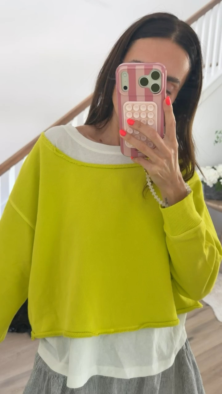This is such a fun way to wear color. The bright pullover instantly makes the outfit pop, while the layered white tank and easy striped shorts keep it feeling relaxed and casual. Perfect for cooler mornings now and an easy transition into fall.

Size XS

lime green sweatshirt, striped shorts, casual outfit, layered look, colorful outfit, everyday style, transitional fashion, weekend outfit, comfortable clothes, affordable fashion, annabrstyle

#LTKActive #LTKootd #LTKTravel