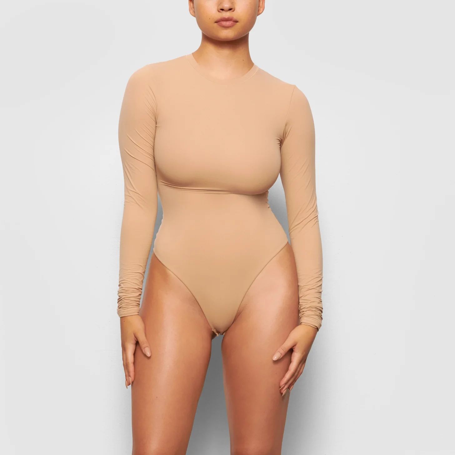 FITS EVERYBODY LONG SLEEVE CREW NECK BODYSUIT | SKIMS (US)