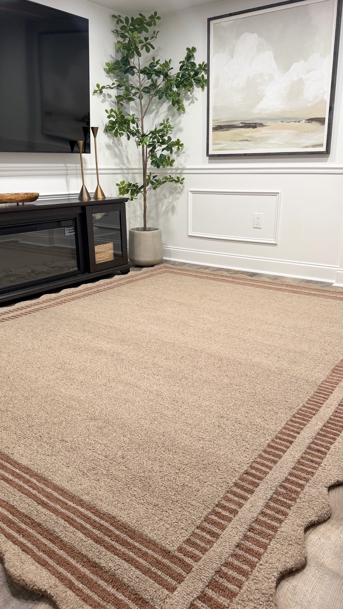 The scalloped edges had me, but those warm neutral tones sealed the deal. 🤎

This rug added such a cozy feel to our media room, and I love how the brown border helps frame the space while keeping everything feeling warm and inviting.

Such a simple way to bring in more texture and warmth without changing the whole room. ✨

#LTKHome #LTKSeasonal #LTKmomlife