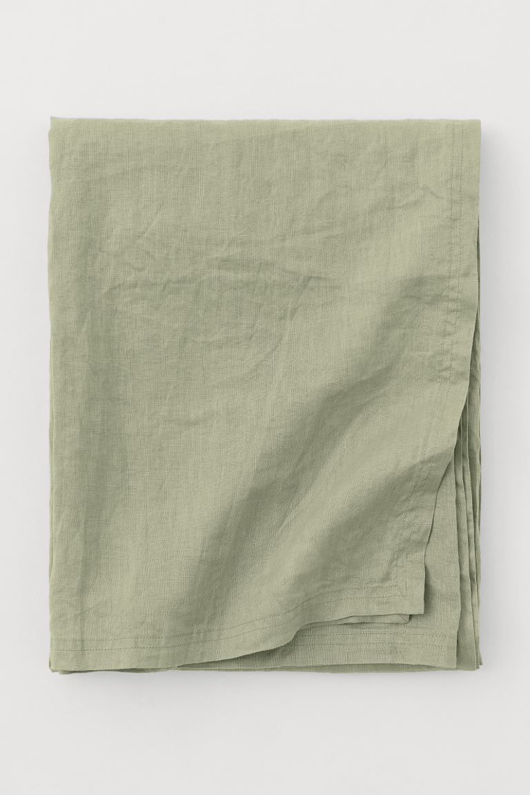 Tablecloth in a cotton and linen weave. | H&M (UK, MY, IN, SG, PH, TW, HK)