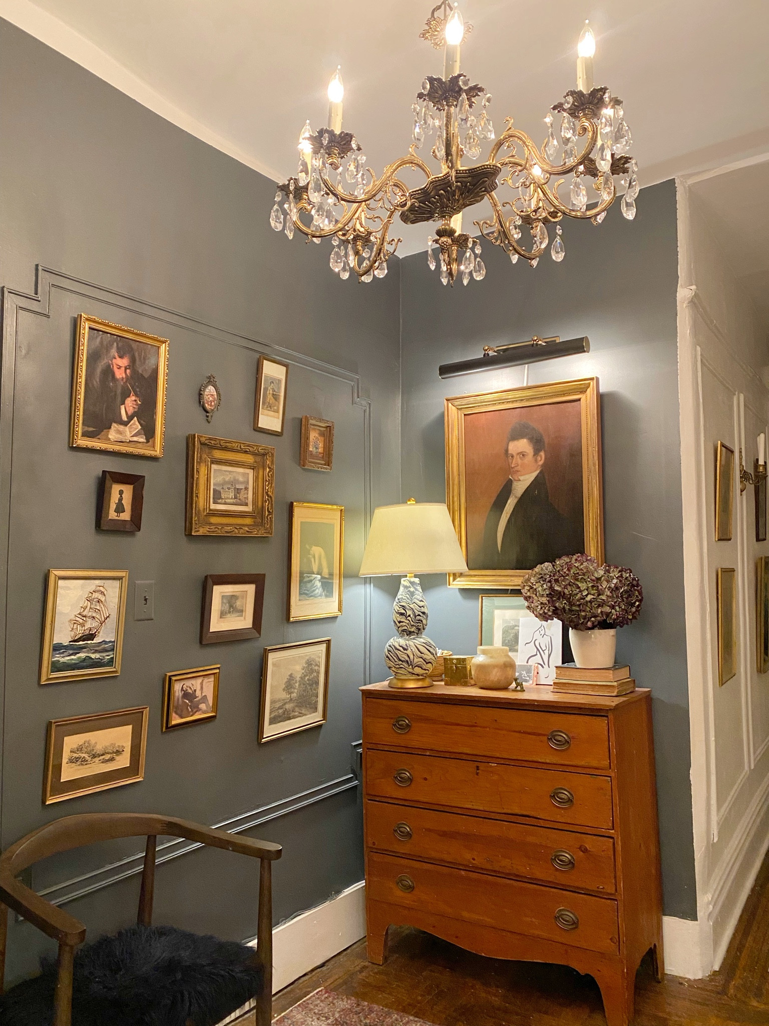 Picture light, antique dresser, classic chandelier 

#LTKsalealert #LTKstyletip #LTKhome