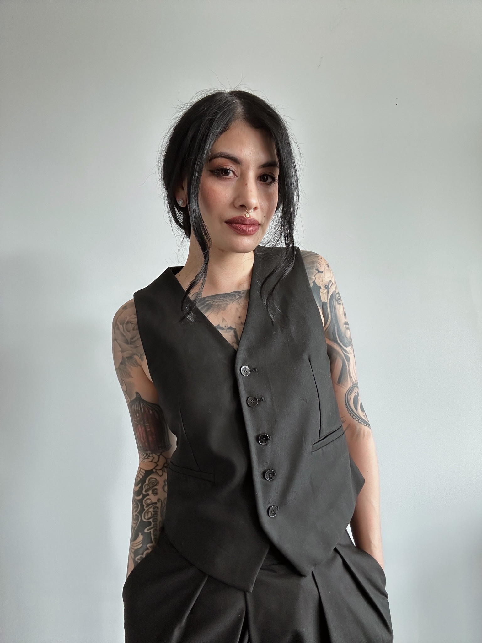 Black vest set black pleated pants 

#LTKstyletip #LTKFind #LTKSeasonal