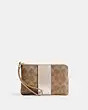 Corner Zip Wristlet In Signature Canvas | Coach Outlet CA