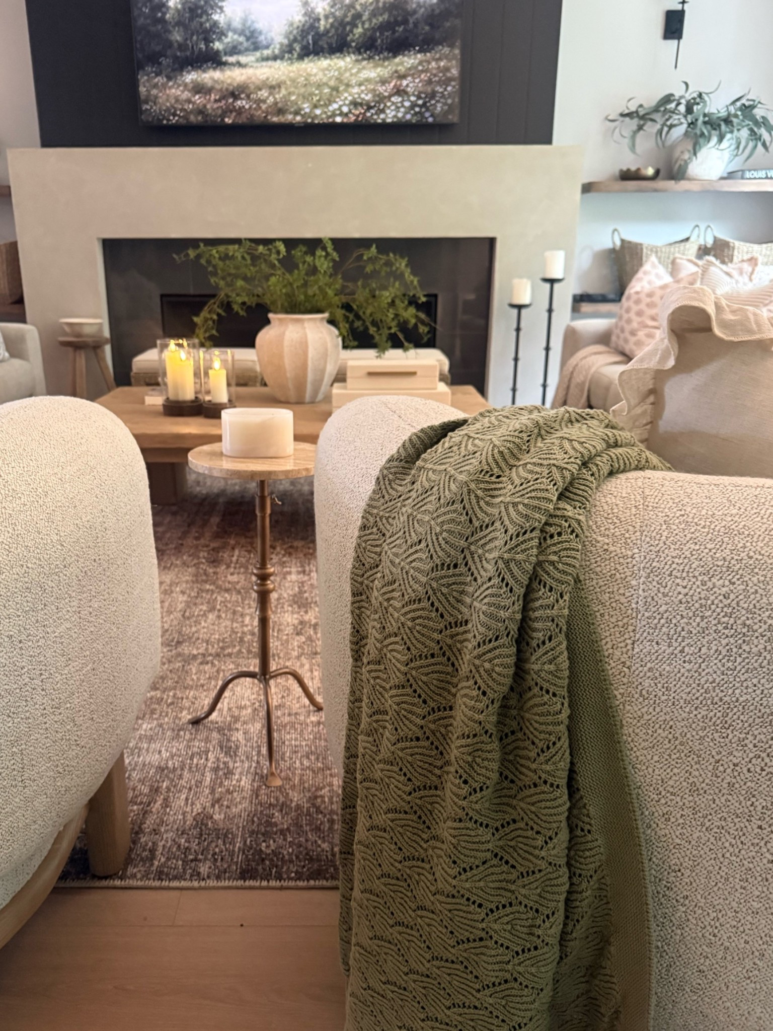 Cozy neutral view…love the subtle texture of this green throw. 
Summer living room inspiration