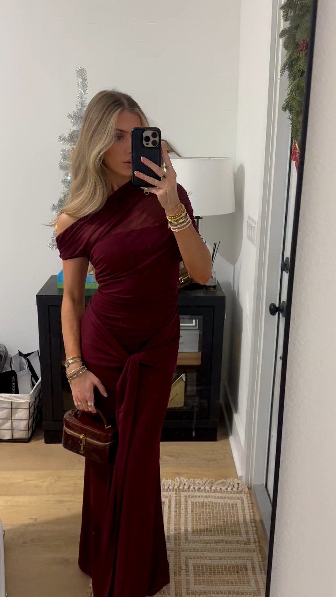 Holiday party. Showpo dress size US 2 with my favorite Amazon heels and my newest Vivrelle rental my. Code is SLOANEVOSEN  Nicolette Maxi Dress - Cape Sleeve Off Shoulder Dress In Wine delivers a confident, curve-loving fit with clean lines that highlight your shape without the fuss. The rich wine hue pairs beautifully with glowy makeup and a sleek updo, letting the cape detail do the flirting.
From aisle to after-party, this is one of those dresses that makes getting ready feel easy, slip on, show up, and feel amazing. Inclusively designed so every body can claim the spotlight, because the best look is the one you feel yourself in. 

#LTKHoliday #LTKootd #LTKFindsUnder100