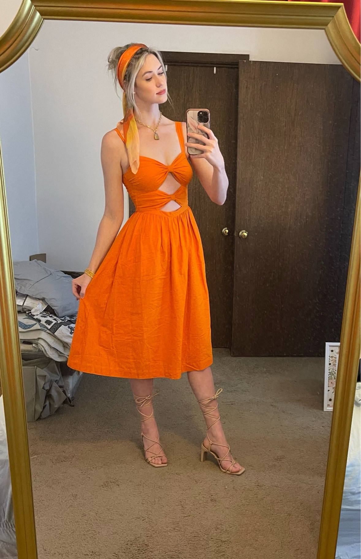 How adorable is this orange double cut out midi dress from the Fe Noel x Target spring designer collection?! It’s only $38, but it feels like such a high quality dress!

I paired it with a hair scarf from the same collection and a pair of tie up heels that are only $40 at Target! 

This dress runs a little bit big in the waist. If you’re in between sizes, I recommend sizing down. I sized down one size to an XS. The tie up heels run true to size! 

If your size is currently sold out in this dress, keep watching the website - they’ve been restocking more sizes almost every day! 

#LTKSeasonal #LTKunder50 #LTKshoecrush