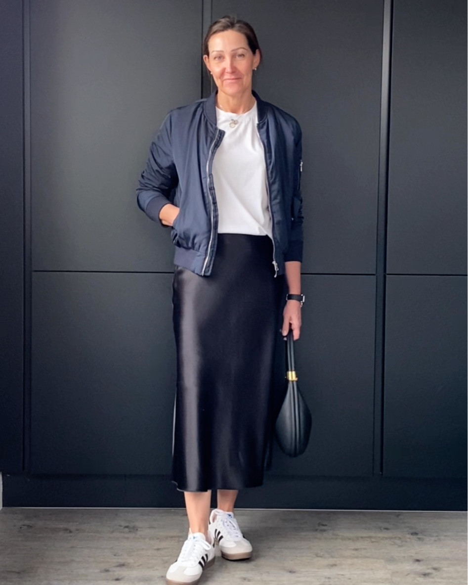 Spring outfit with bomber jacket, satin skirt and sambas
I’m in a size 38 Arket skirt and medium white Arket t shirt x