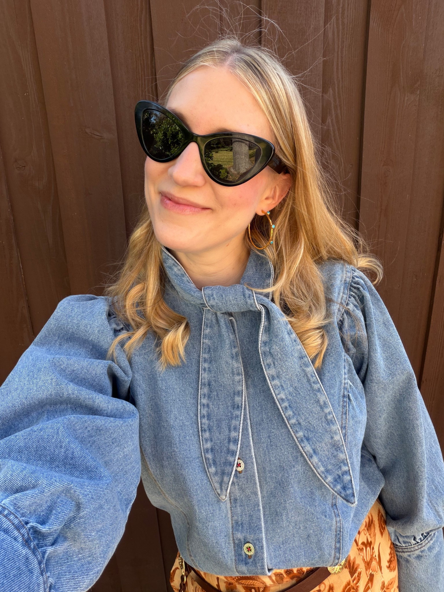 Just in the cutest denim blouse! It is pricey but the quality is gorgeous and know it will be a blouse I wear many years to come! I couldn’t get over the adorable collar and tie with it! I am wearing a size small and would say it fits tts - a fun and chic western look!