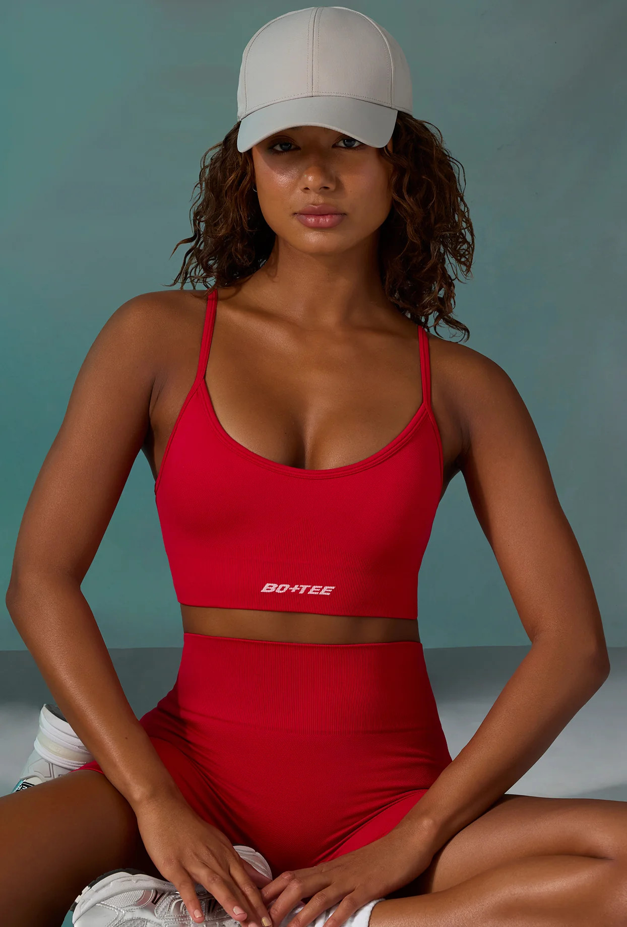 Super Sculpt Scoop Neck Sports Bra in Tango Red | Oh Polly