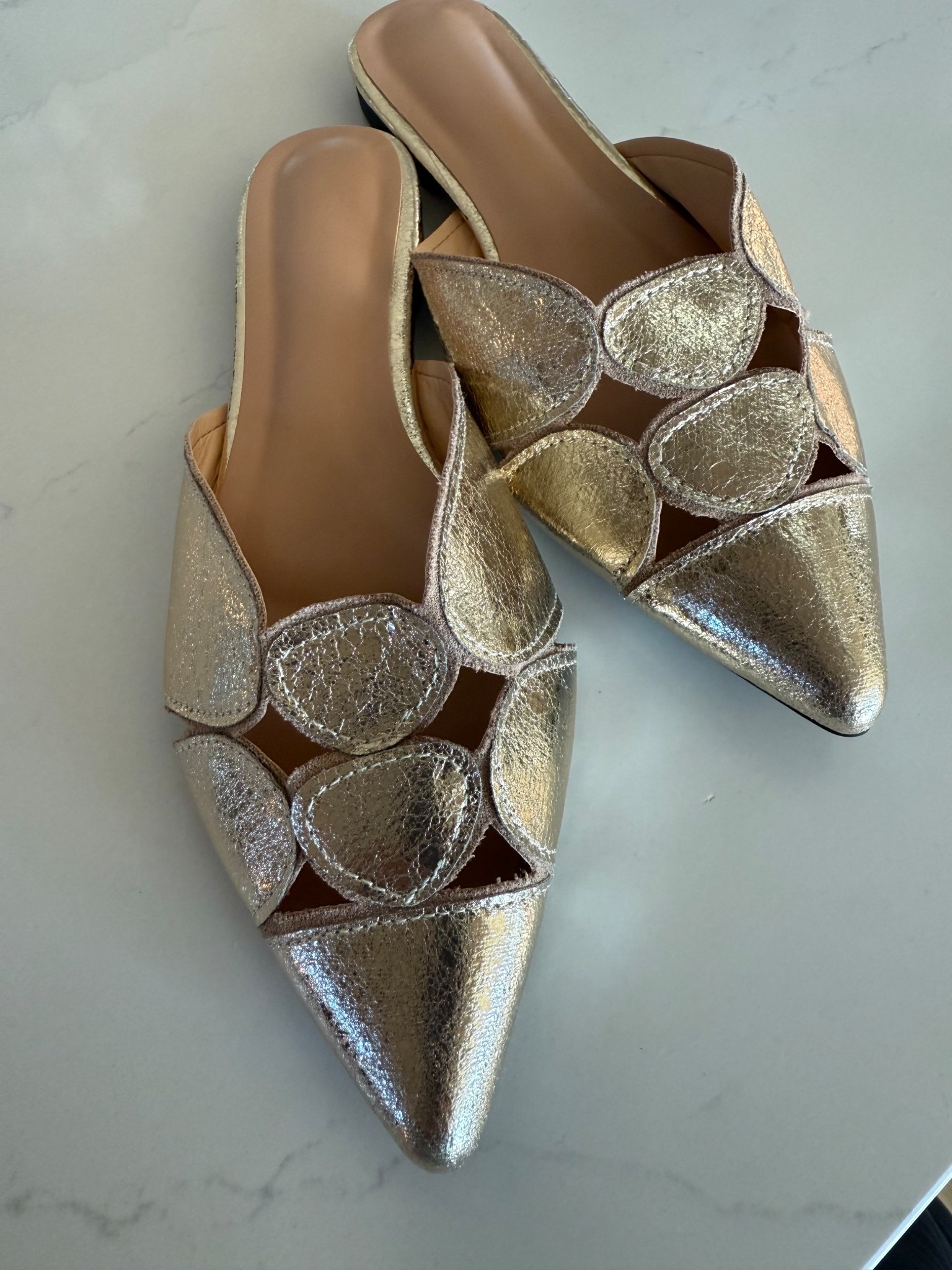 The cutest gold flats for spring!