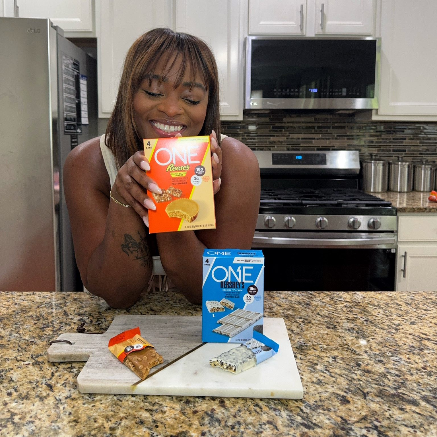 #ad These new @one1brands x Hershey’s Cookies ‘n’ Creme and Reese’s Peanut Butter Lovers Protein Bars from @Target are 18 grams of protein dressed up as my favorite candy bars. I mean… it’s lowkey a candy bar cosplaying as a protein bar, and I’m here for it! #ONEHersheys #ONEReeses #ONEProteinBars
Go get yours at #target before I buy them all!  #TargetPartner
