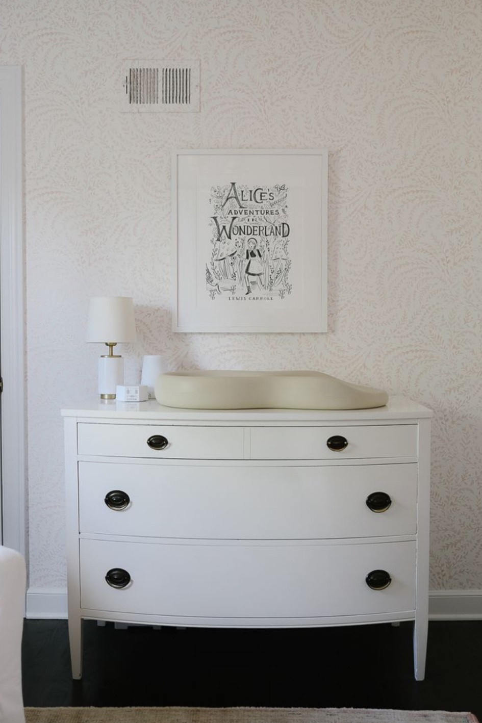 white traditional dressers for a nursery! Photo by: Danielle Moss