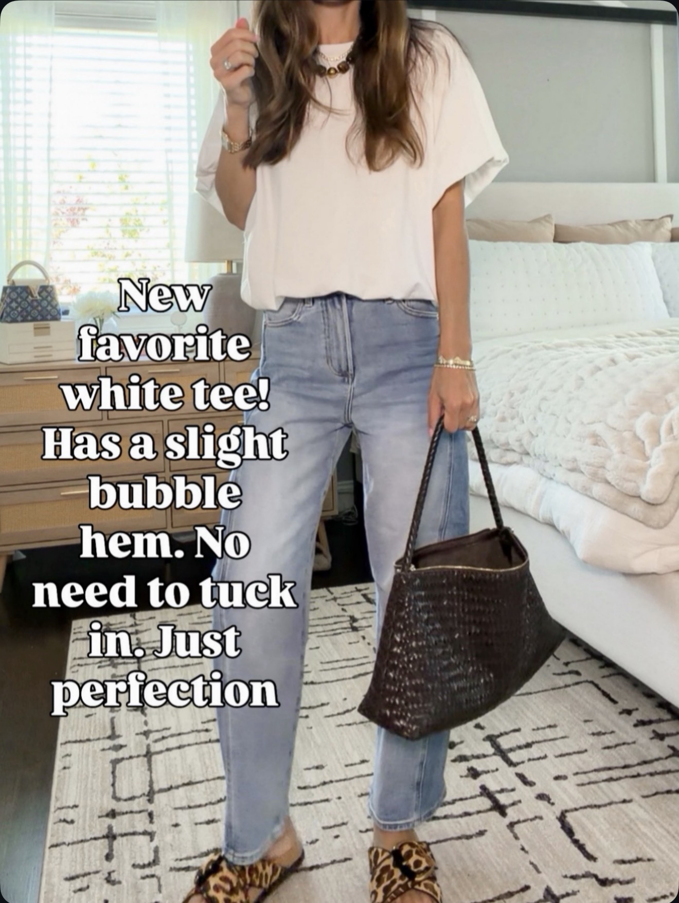 A white tee that does all the work for you 👏 No tucking, no fuss, just the perfect fit. Wearing size 24 jeans and small tee

#LTKootd #LTKmomlife #LTKOver40