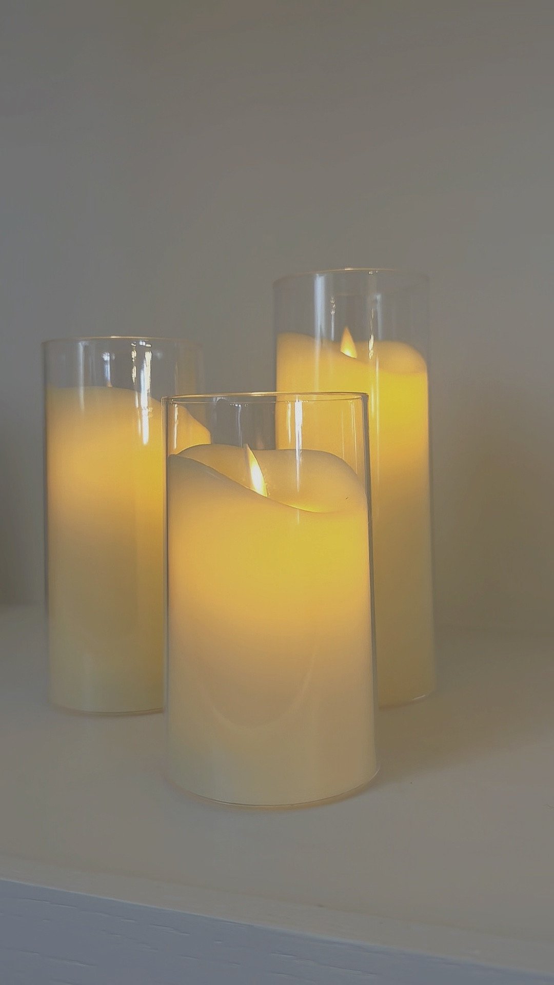 How cozy are these candles?!? They come in a set of 3 and are battery operated. It comes with a remote and you can set a daily timer for turning on and off. So happy with these 💛

#LTKunder50 #LTKhome