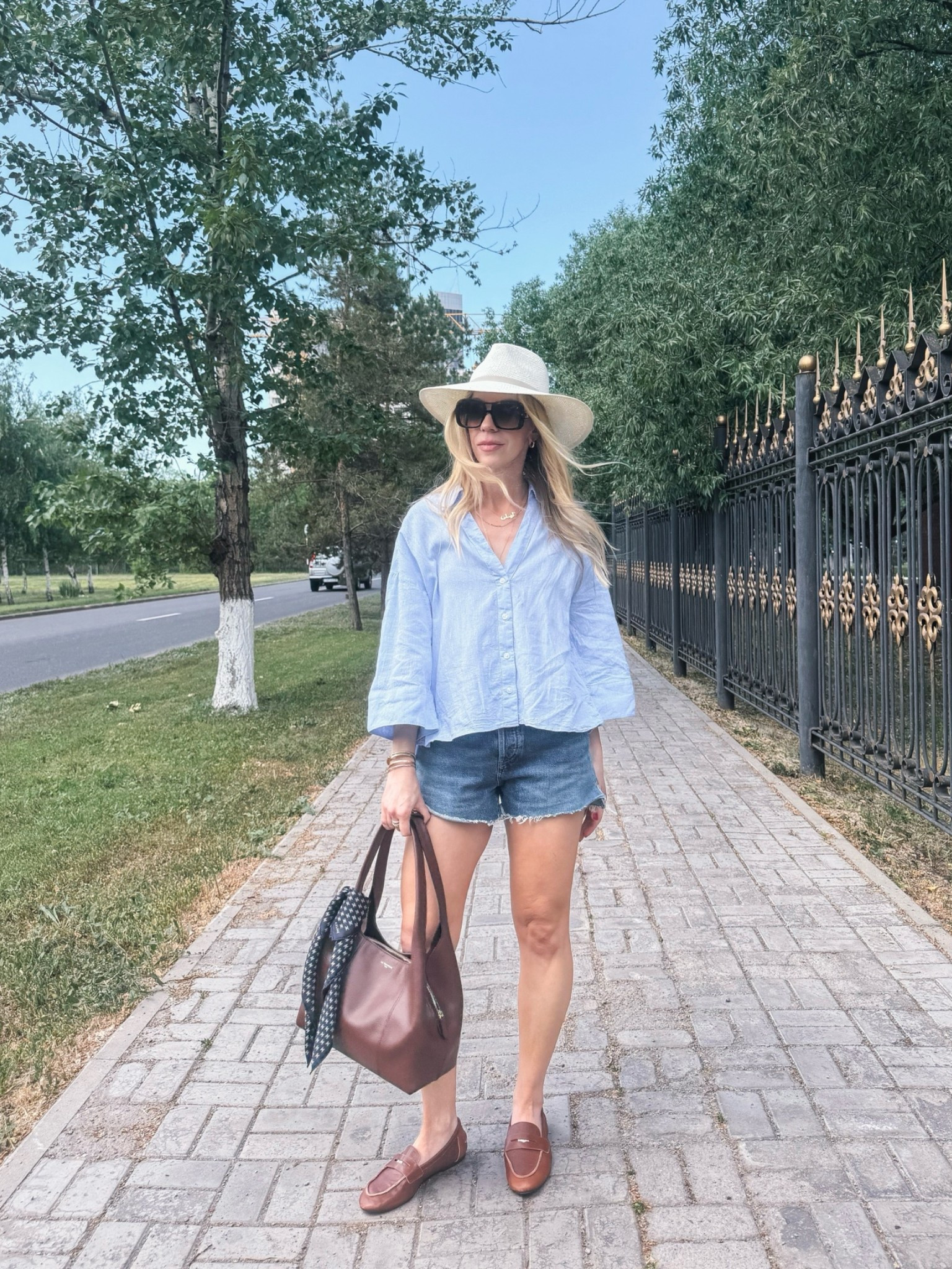 My Le Tanneur handbag is 20% off right now!

Casual summer travel outfit, linen shirt, cutoff denim shorts, @Zara leather loafers, @Janessa Leone white straw hat

#LTKSaleAlert #LTKTravel #LTKSeasonal