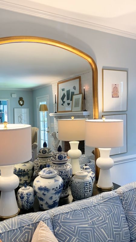 Living room decor, gold floor leaner mirror, white lamps, velvet tiger pillows

#LTKhome #LTKSeasonal