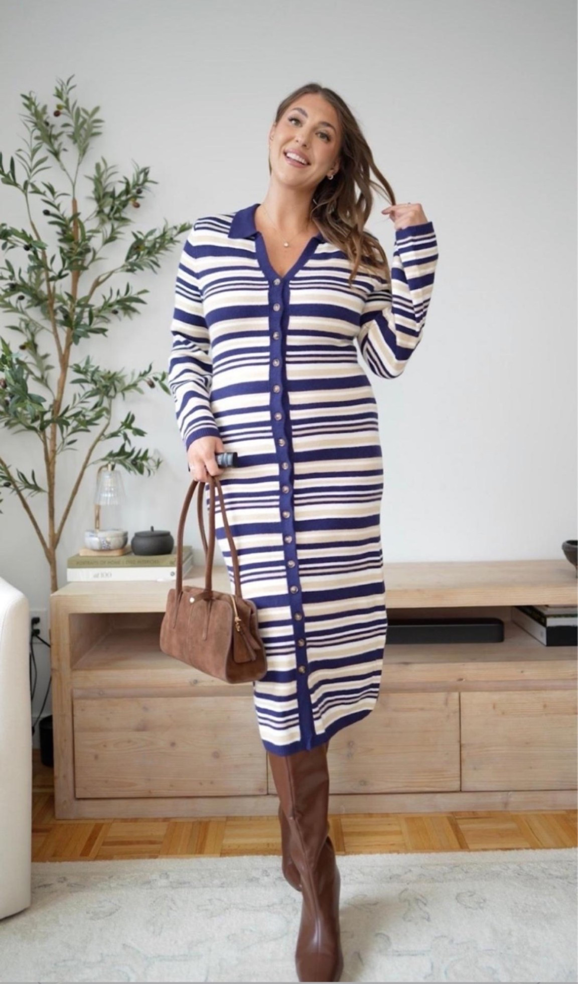 This striped sweater dress is giving polished fall without trying too hard 🤎 The navy and cream feels so classic, and I love it paired with tall brown boots and a suede bag.

fall sweater dress, striped midi dress, fall outfit ideas, tall brown boots, classic fall style, casual chic outfit, transitional fall fashion

#LTKWorkwear #LTKMidsize #LTKSeasonal