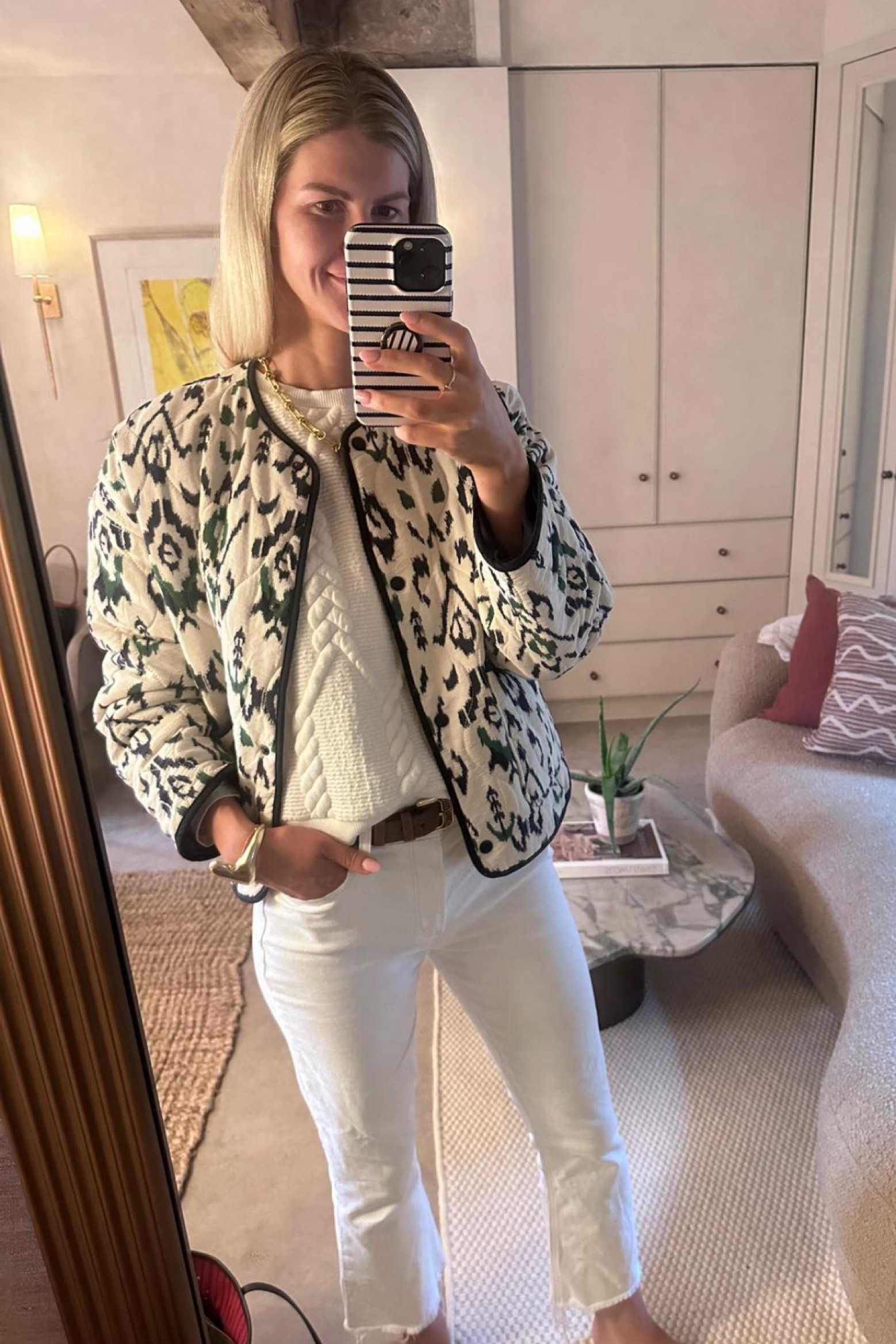 White jeans with a miu miu belt and a knitted white jersey and a quilted jacket. 

#LTKireland #LTKworkwear #LTKstyletip