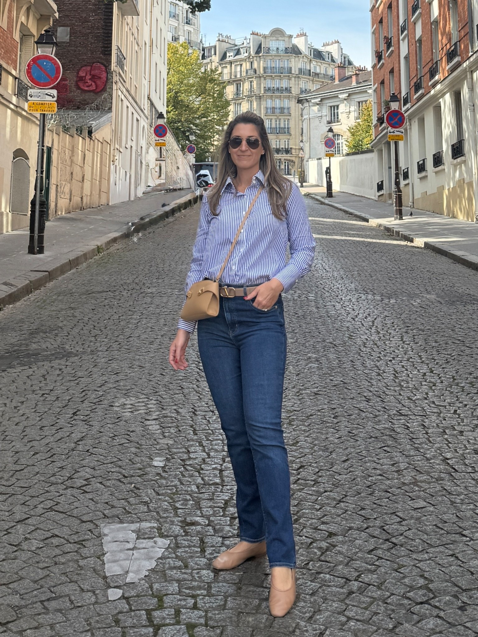 Today’s simple outfit formula walking around Paris included a striped collared button down shirt + blue pencil jeans + neutral flats and accessories. 

Shirt runs slightly small. I sized up to a Medium. Jeans run TTS. Wearing a 28. Flats run TTS. Wearing a 9.5. (If in between sizes size down.)

#LTKOver40 #LTKTall #LTKTravel