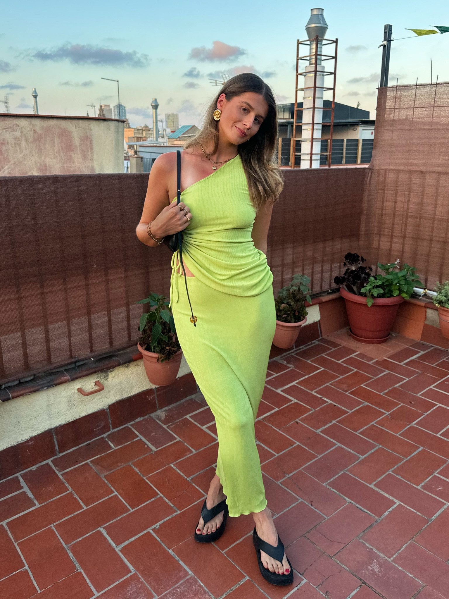 Barcelona outfits, euro summer, holiday Co ord, black chunky croc sandal flip flop, black shoulder mini bag jacquemus, gold jewellery gold shell chunky earrings mango oh Polly asos H&M occasion wear date night co ord Green lime skirt and cut out one shoulder top 

#LTKeurope #LTKwedding #LTKsummer