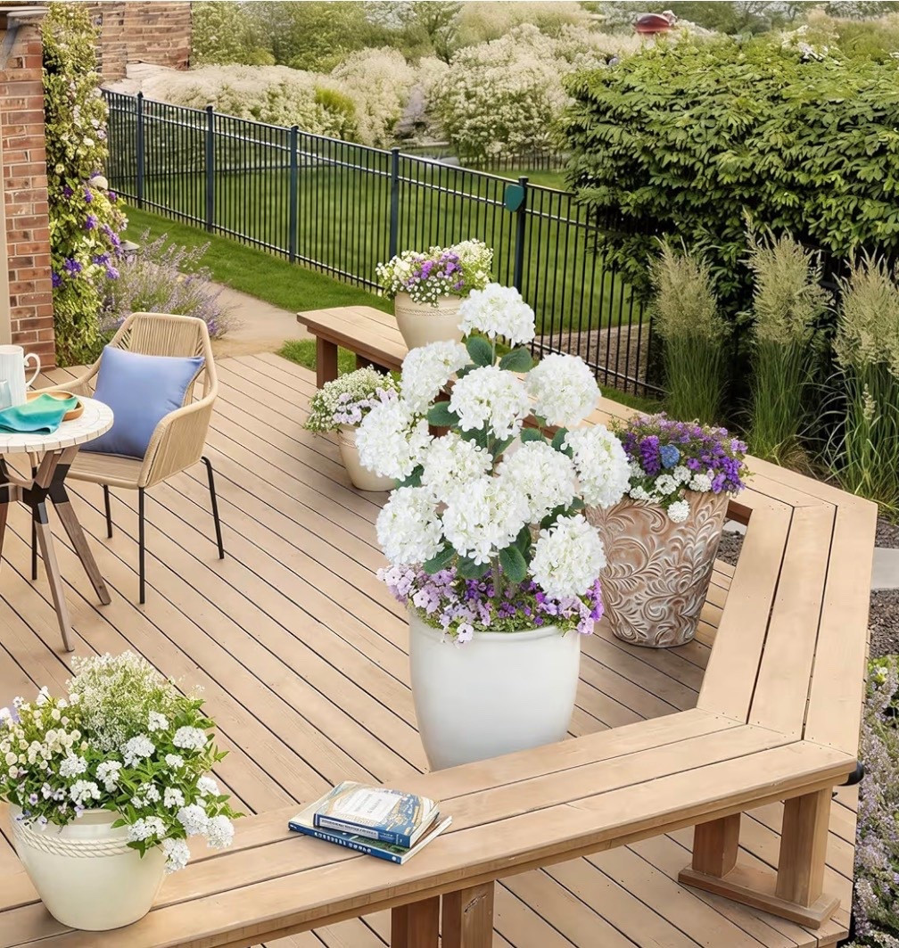 Lifelike Artificial Tree Design: This premium artificial hydrangea tree features dense, layered blooms, textured leaves, and natural branching. As realistic artificial flower trees for outdoors, these outdoor faux trees add height, structure, and elegance to any setting
Weather-Resistant Materials: Crafted from silk petals and durable plastic stems, this artificial hydrangea tree with spikes is UV-resistant, waterproof, and fade-proof. Ideal as artificial outdoor plants use in sun, rain, or wind #springdecor #spring #porchdecor #fauxflowers 

#LTKHome #LTKSeasonal