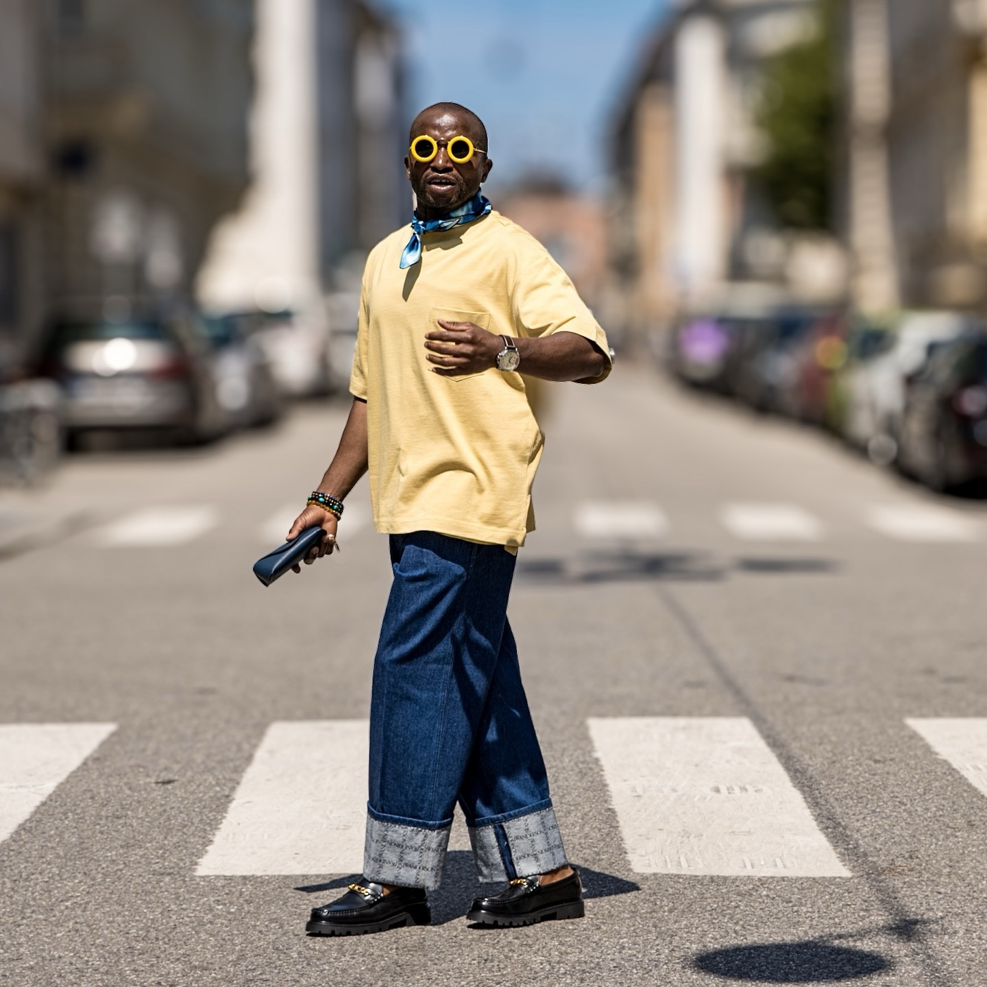 I am excited to share with you my latest outfit. I love expressing myself through vibrant and stylish outfits, and this look is no exception. I am wearing a yellow T-shirt from COS paired with blue jeans from JW Anderson. For footwear, I chose black Margaret loafers from Celine, and around my neck, I added a blue and white scarf from COS. To complete the look, I wore yellow sunglasses from Loewe. I am truly proud of how this look came together, and I hope it inspires you to embrace bold and stylish choices in your wardrobe. Please let me know what you think in the comments!#FashionInspo #BoldStyle #OOTD #LoeweSunglasses #JWAndersonDenim #CelineLoafers #COSFashion #NeckScarf #StylishOutfit #FashionBlogger #DailyLook #VibrantFashion #FashionPhotography #GayNigerian #SelfExpression #FashionDiary #TrendyOutfit #StyleJourney #Fashionista #ColorfulStyle