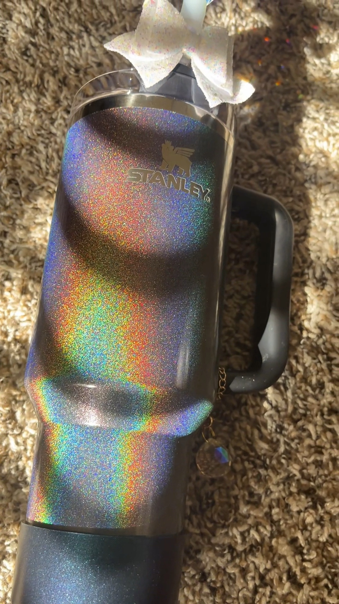 ✨ Staying hydrated never looked so good! Meet my new Stanley Midnight Glitz Tumbler, the perfect mix of sparkle and function. 💧 Whether I’m sipping on water, coffee, or a fun holiday drink, this tumbler keeps it cold (or hot!) for hours. Plus, the sleek design is giving major glam vibes! Tap to shop yours and upgrade your hydration game. #StanleyTumbler #MidnightGlitz #LTKHoliday #HydrationGoals #StylishSips 

#LTKSeasonal #LTKHoliday #LTKGiftGuide